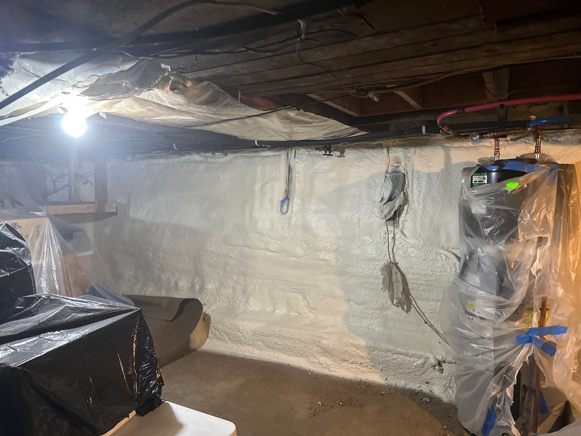 Basement Exterior Walls using Closed Cell Spray Foam by NYS Foam & Energy