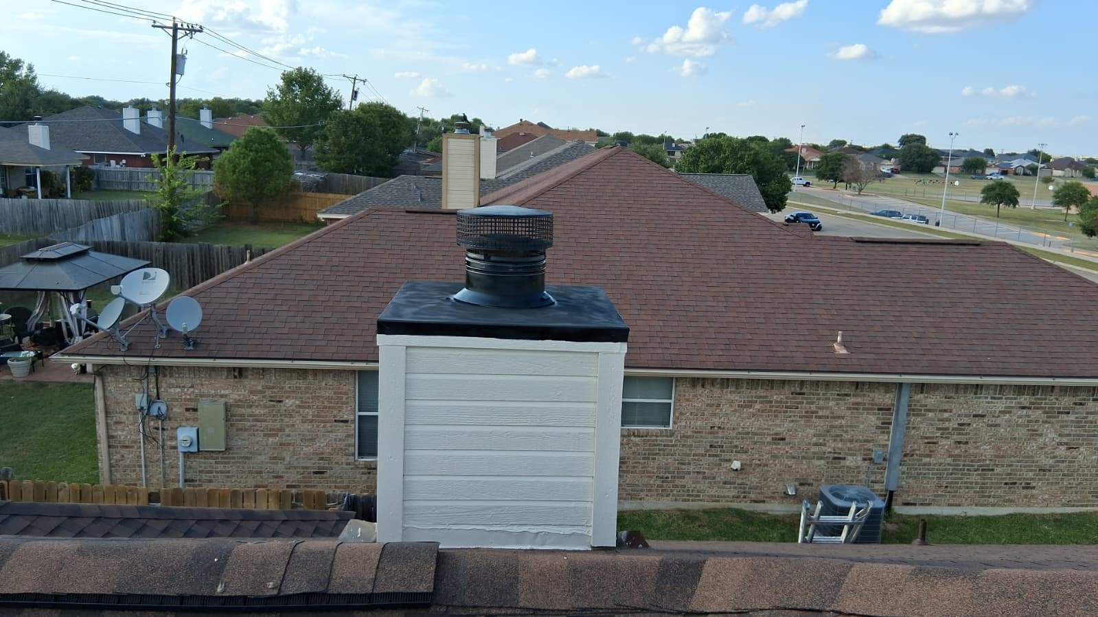 Complete Roof Replacement, Gutter Installation, Chimney Repair, and Window Replacement by Caliber Restoration LLC