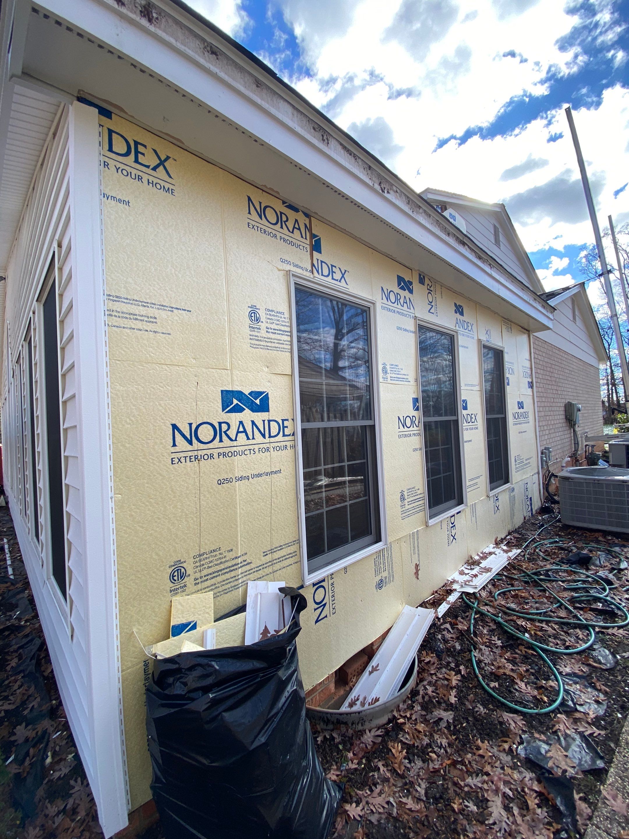 Springfield CertainTeed Charcoal Black Roof & CertainTeed Colonial White Siding by RM Banning, Inc.