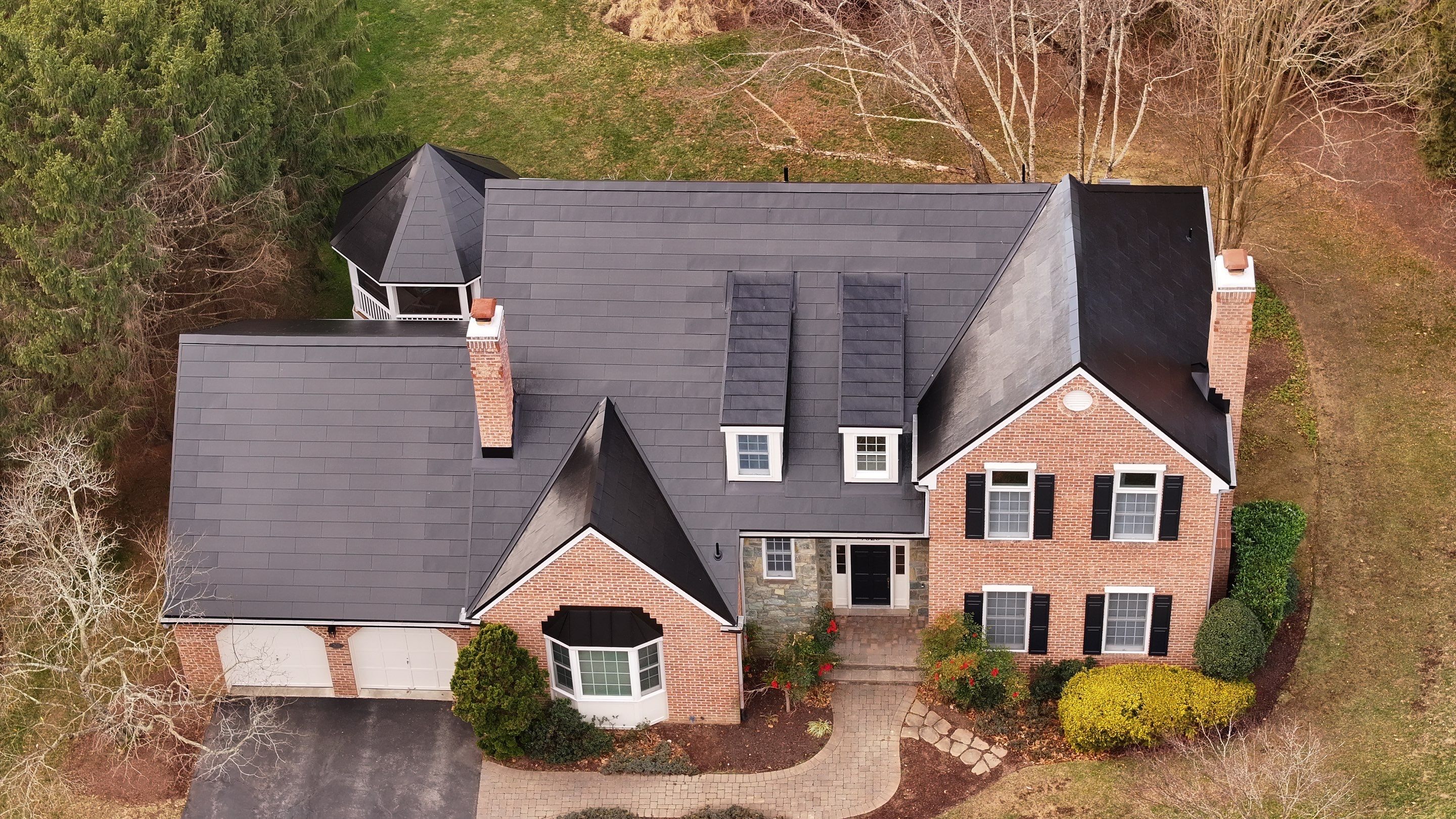 Sleek Tesla Solar Roof Installation by American Home Contractors