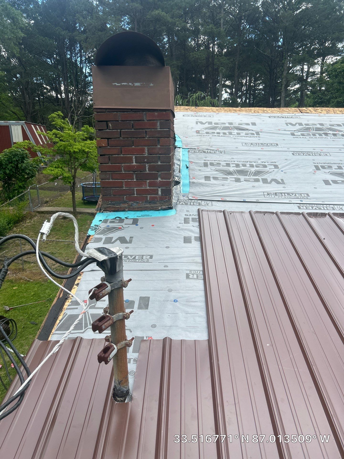 Metal Roof Replacement in Sylvan Springs (Brown) by The Roofing Dudes