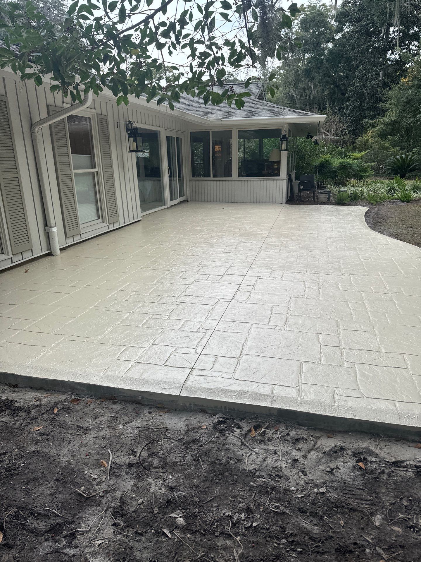 Ashlar Slate Stamped Concrete Patio Installation in Hilton Head Island by Lowcountry Scapes, LLC
