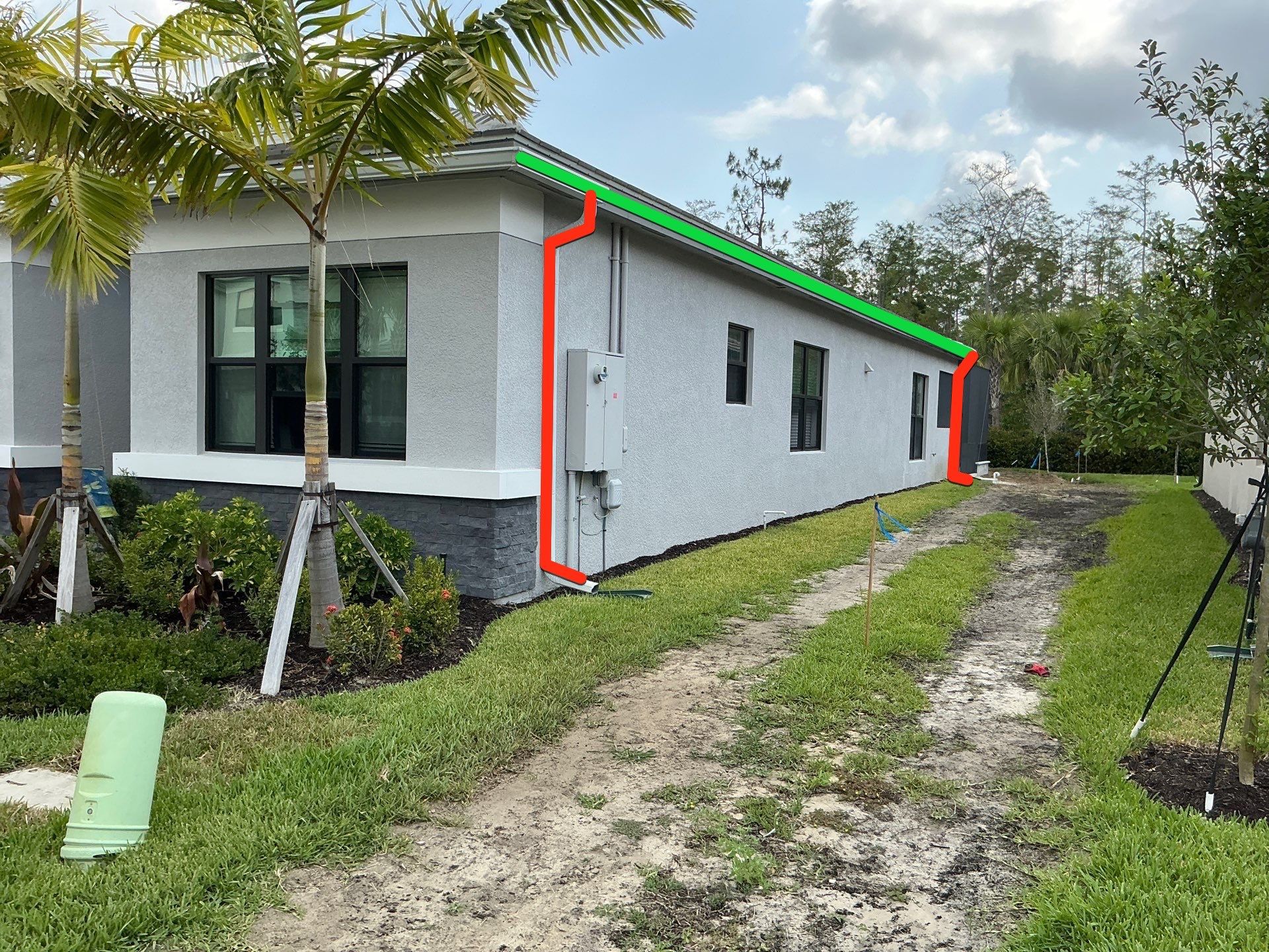 Grey Seamless Gutter Installation in Estero FL by Gutter Professors