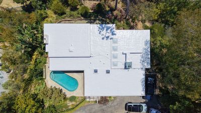 Residential Flat Roof Restoration with Silicone Coating in Brentwood