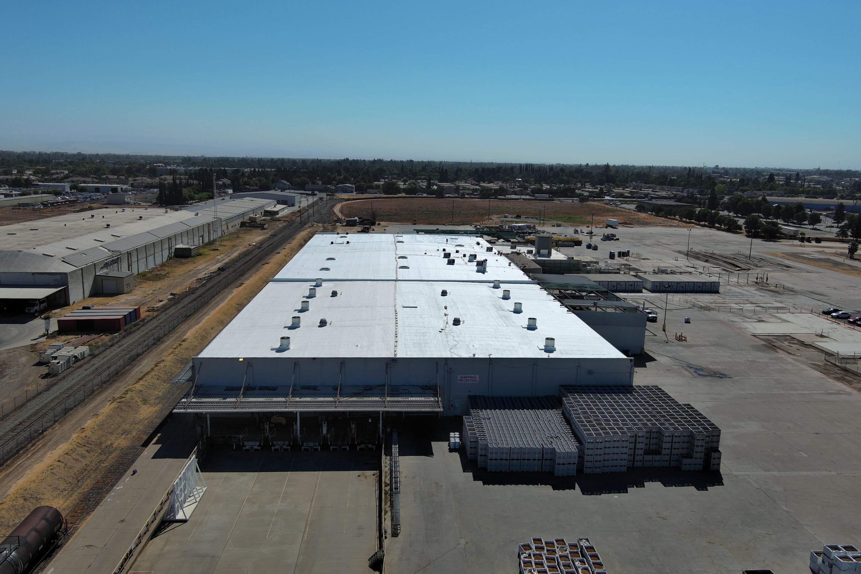 Pro Farms Spray foam roofing project by Straight Edge Roofing Inc