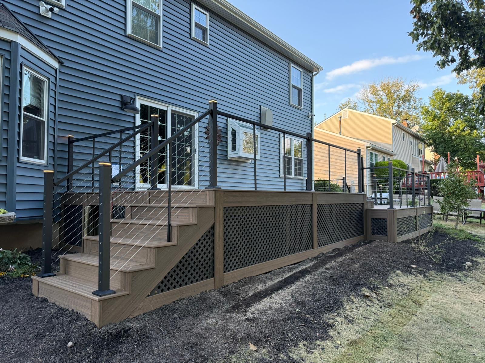 Deck resurface with Trex and cable rails by deck guardian