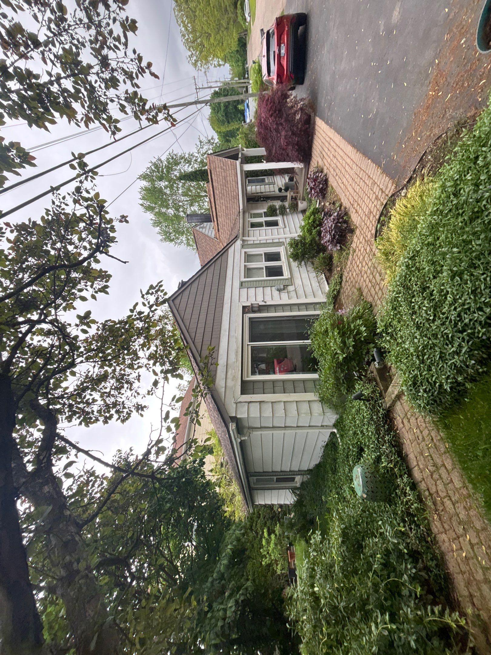 Roof Replacement using Owens Corning Sand Dune by 180 Contractors