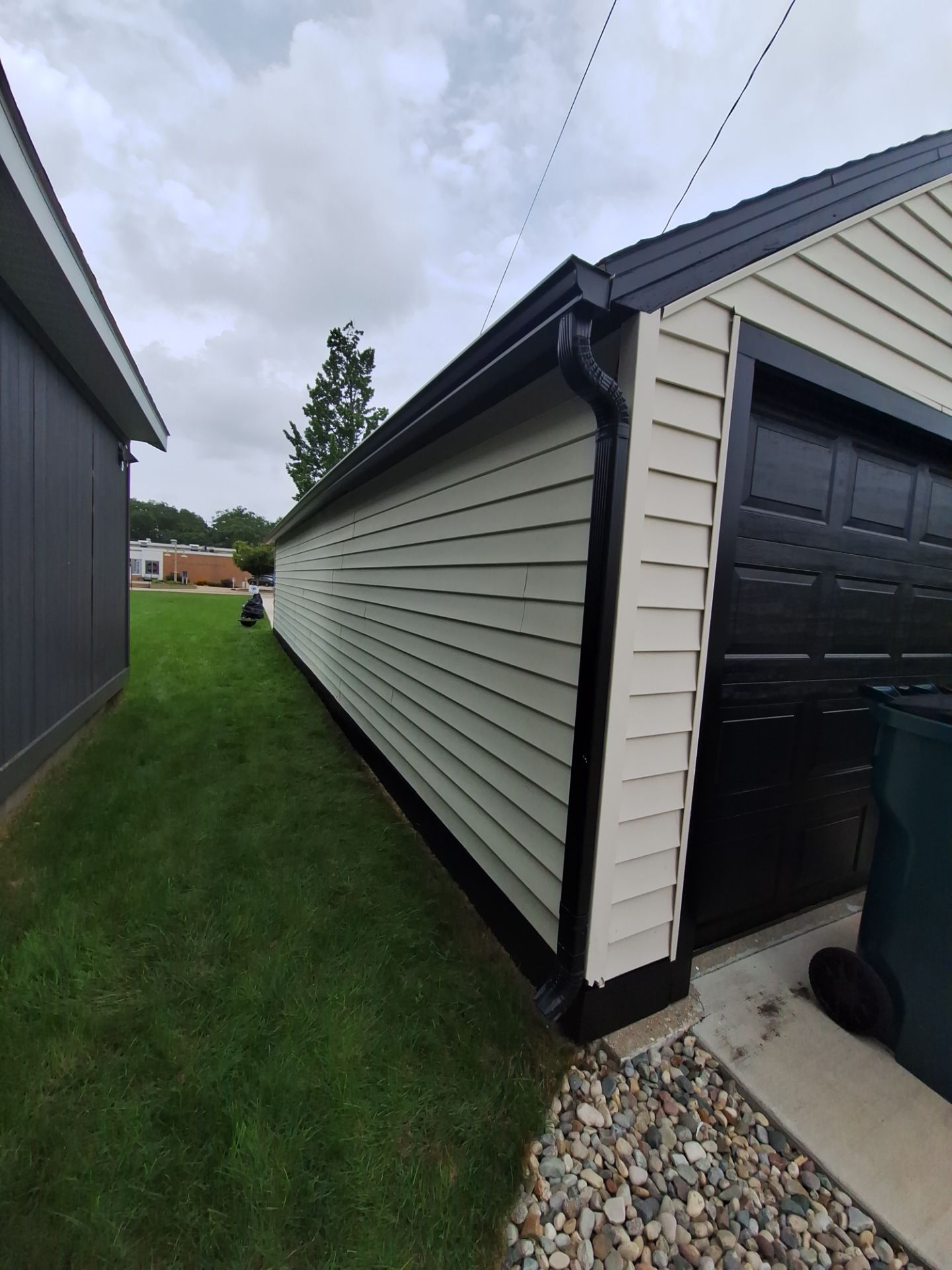 Epoxy Flake Garage Floor & Foundation Refresh – Seamless, Durable, and Clean Finish by Gordon Painting