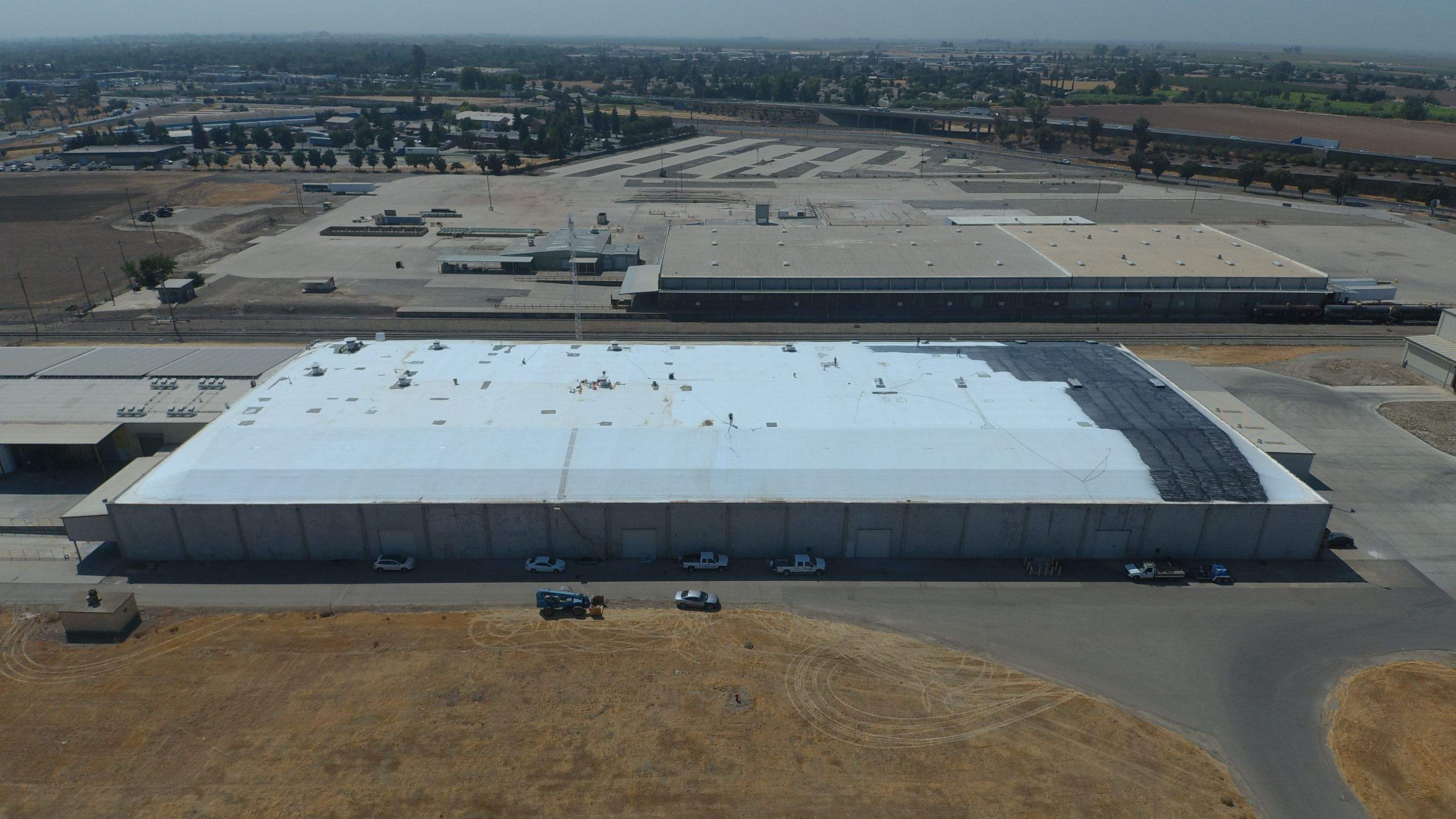 Single-ply restoration system using Conklin Benchmark/PUMA XL fabric and coating by Straight Edge Roofing Inc