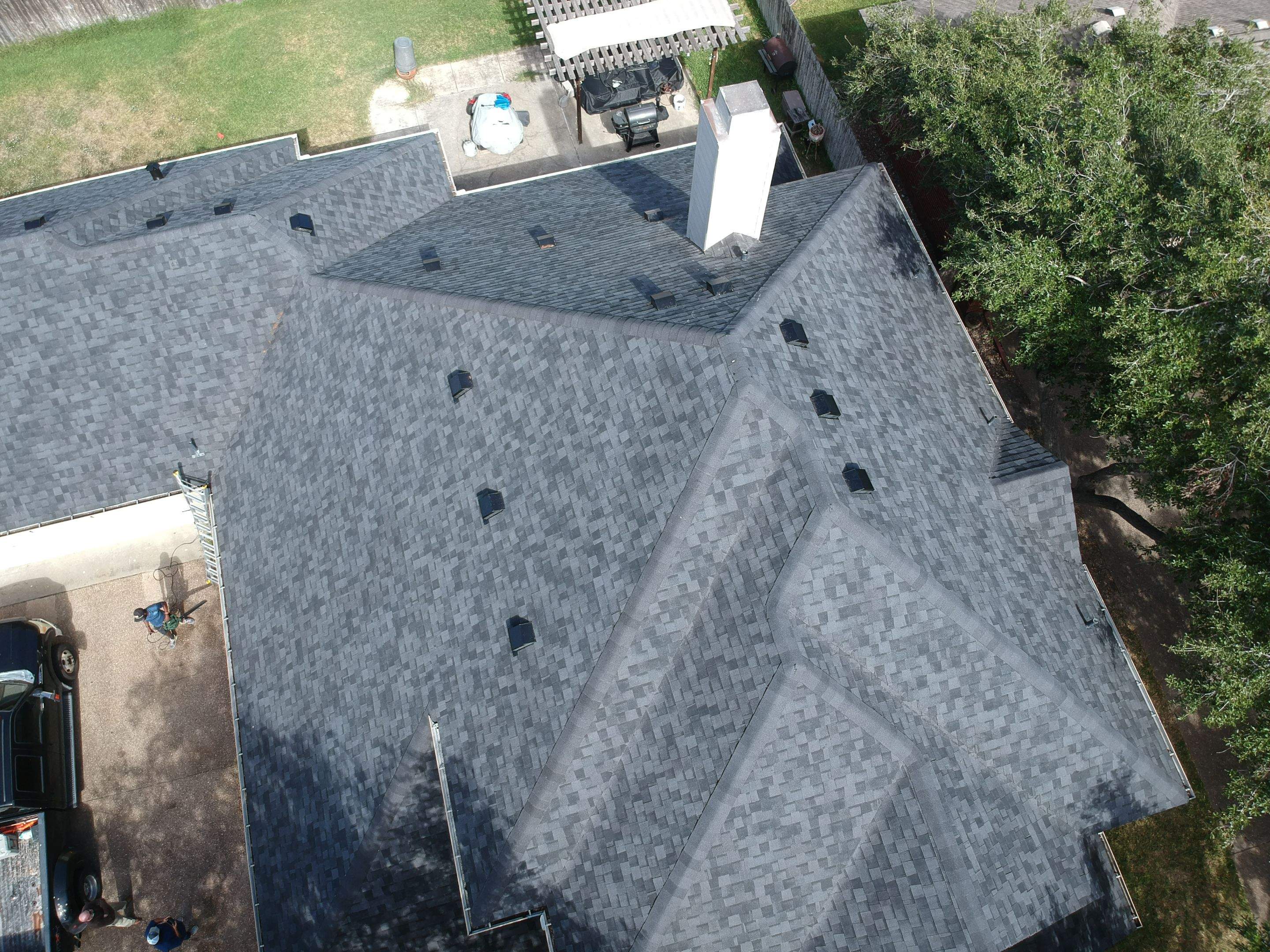 Residential Roofing Installation using Certainteed Landmark Moire Black by Galvan Roofing and Construction