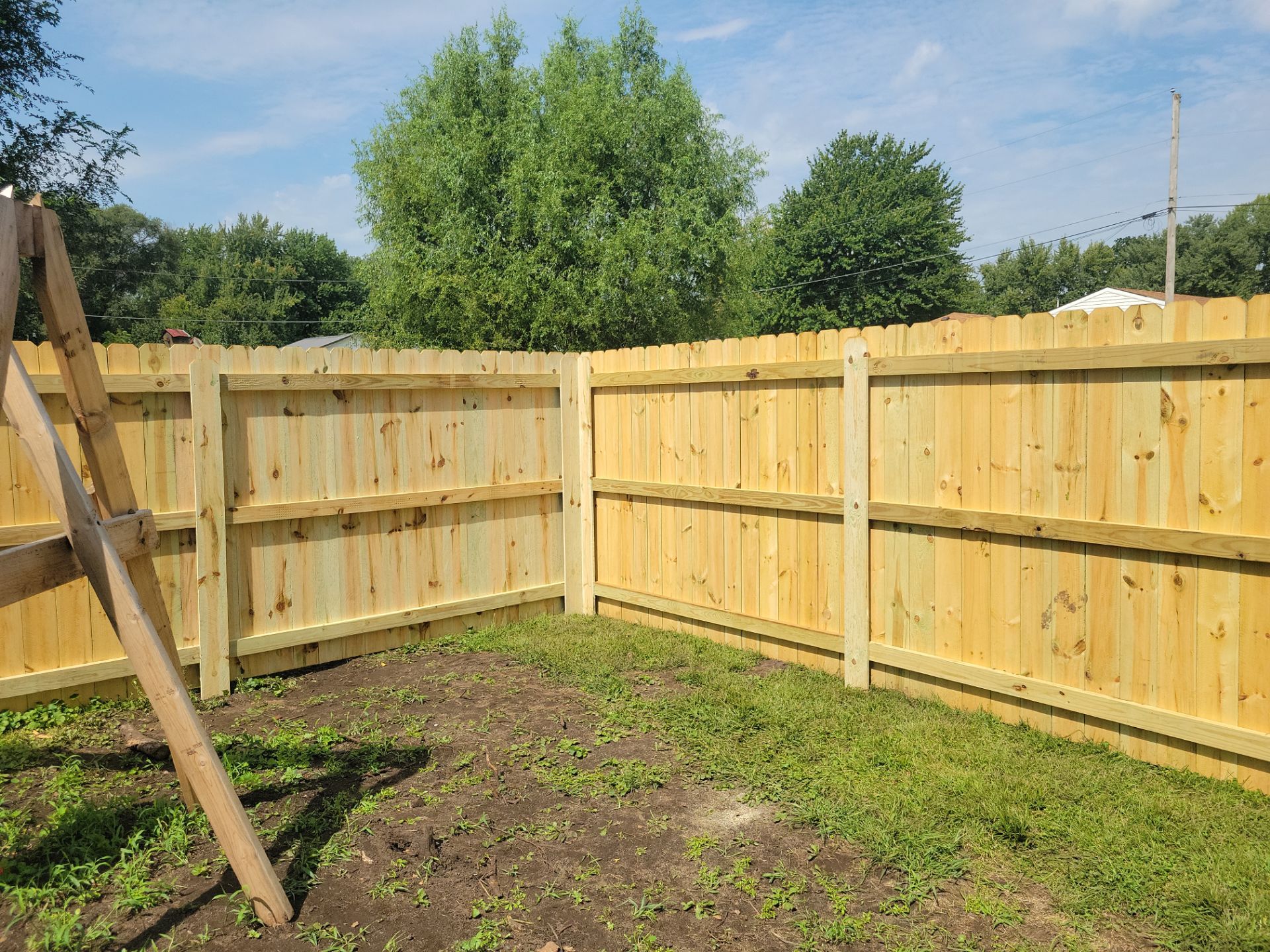 Treated Pine Privacy and Picket Fence Installation in Evansdale by Perfect Picket Fence and Stain