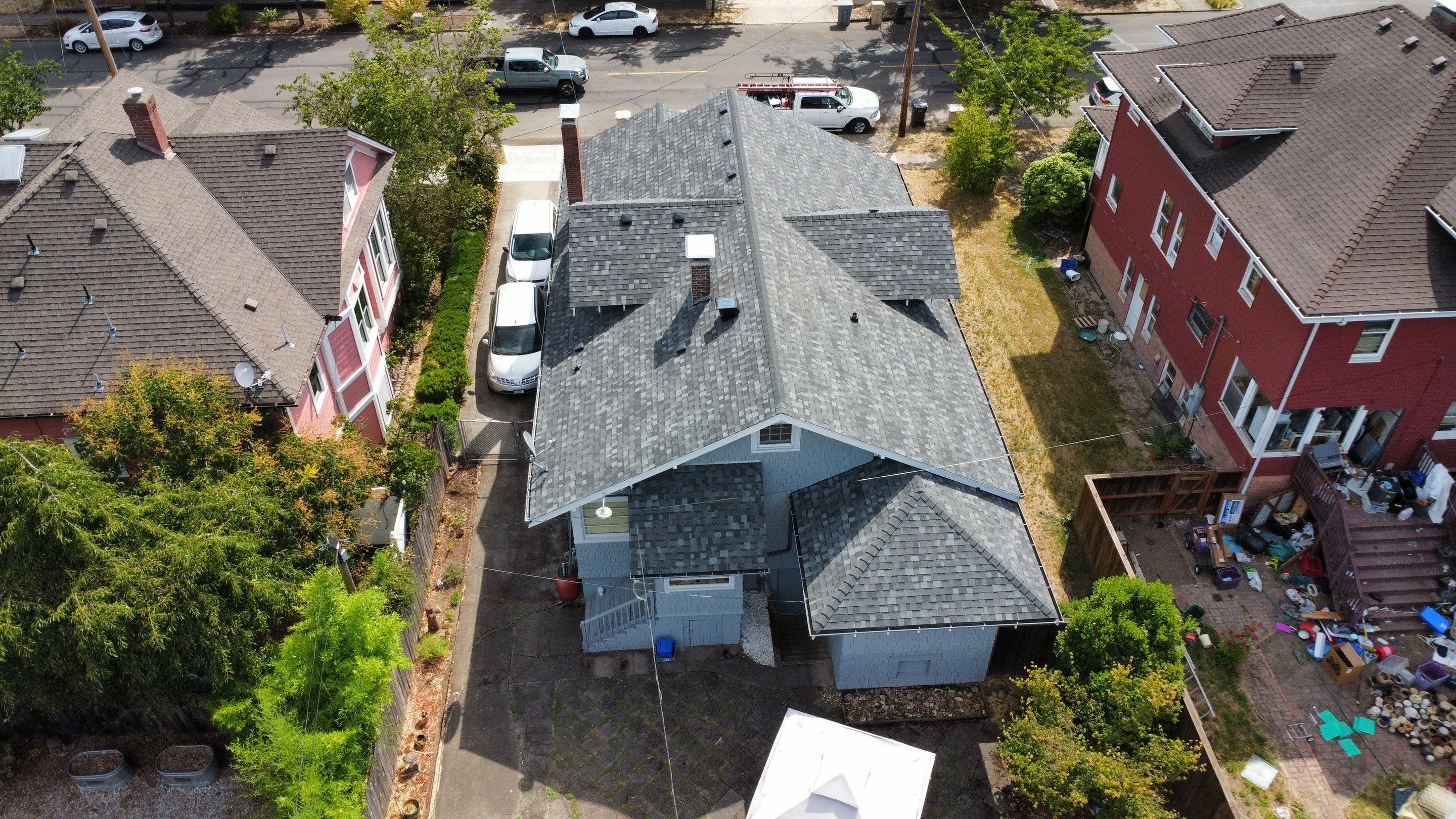 Residential Roofing Installation using IKO Dynasty (Color: Summit Grey) by Orezona Building & Roofing Company, Inc.