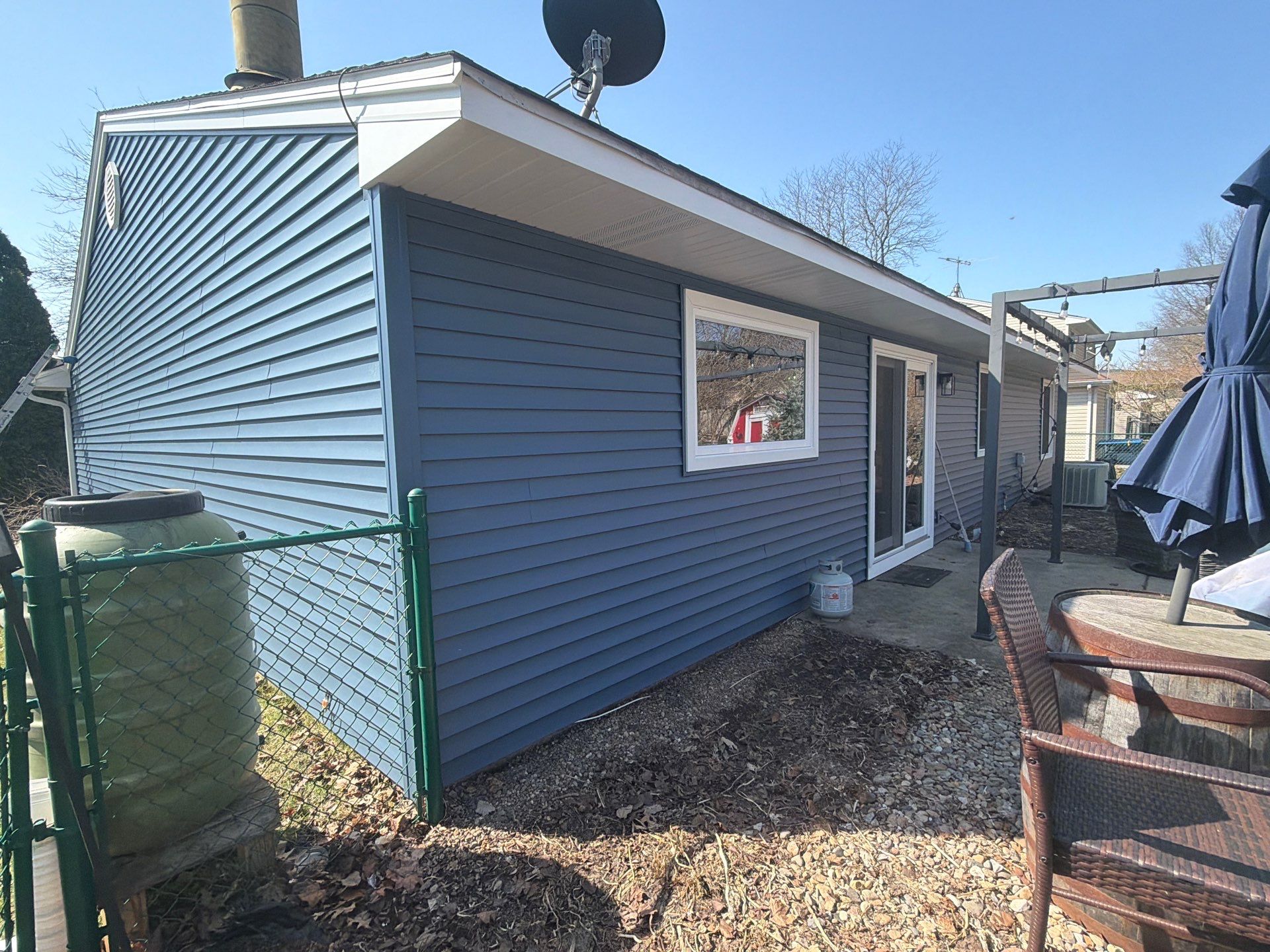 Siding and gutters replacement by Optimal Home Improvement 