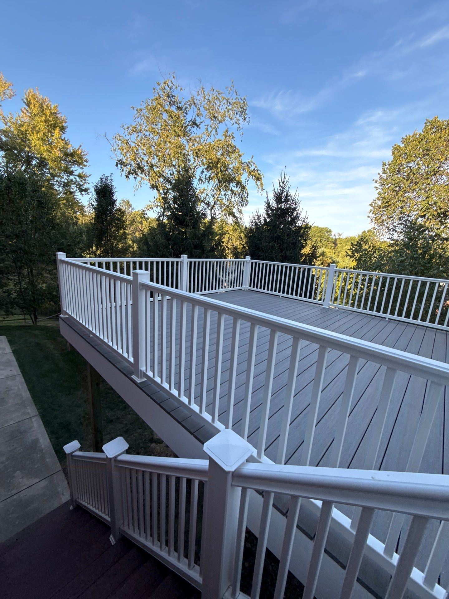 Deck extension  by Cousins Roofing Siding & Decks