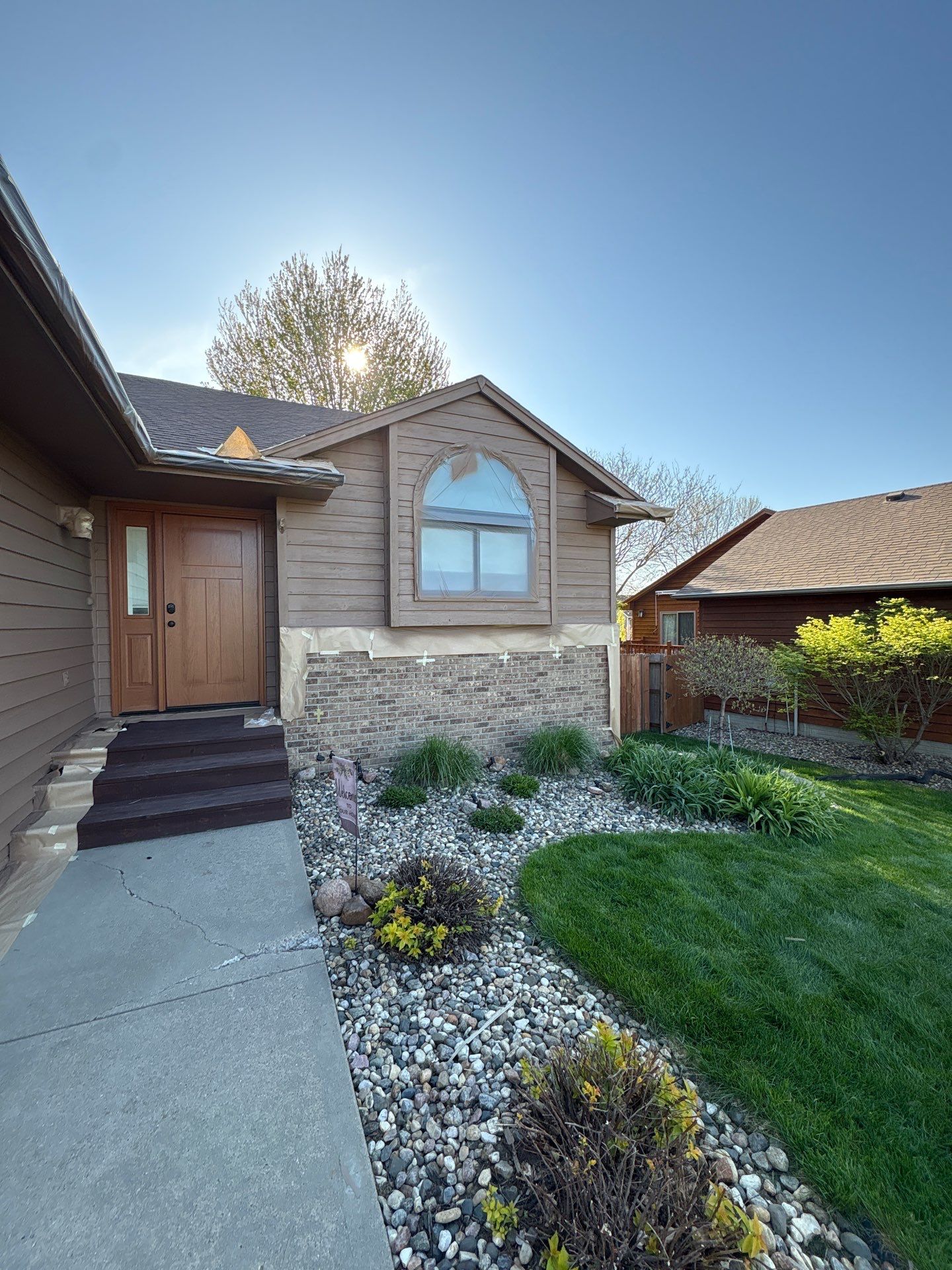 Wood Siding Restoration and Exterior Painting in Sioux Falls by Select Painting, Coatings & Garage Cabinets