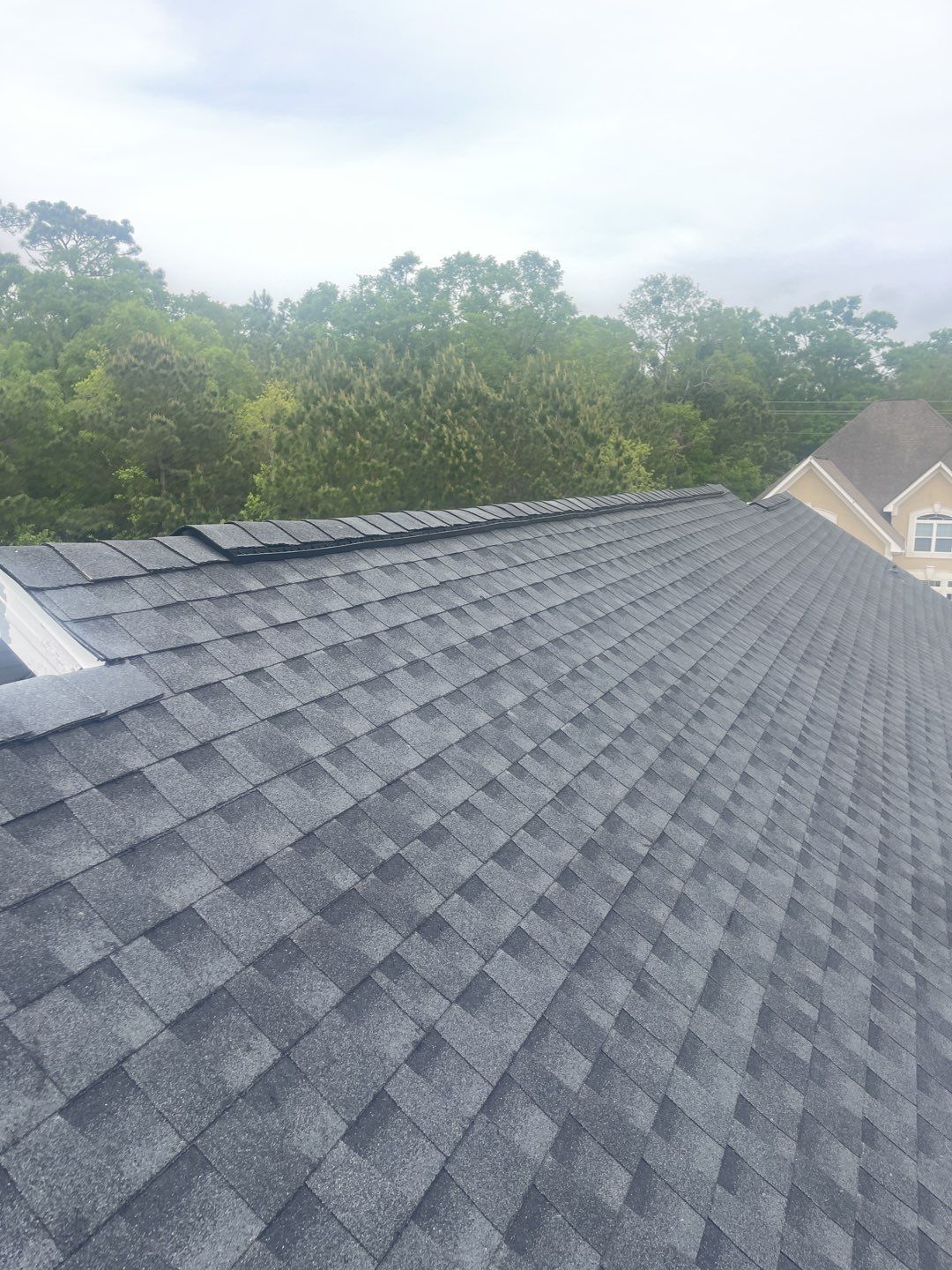 Residential Roofing Installation using Roof Replacement by American Roofing & Construction LLC