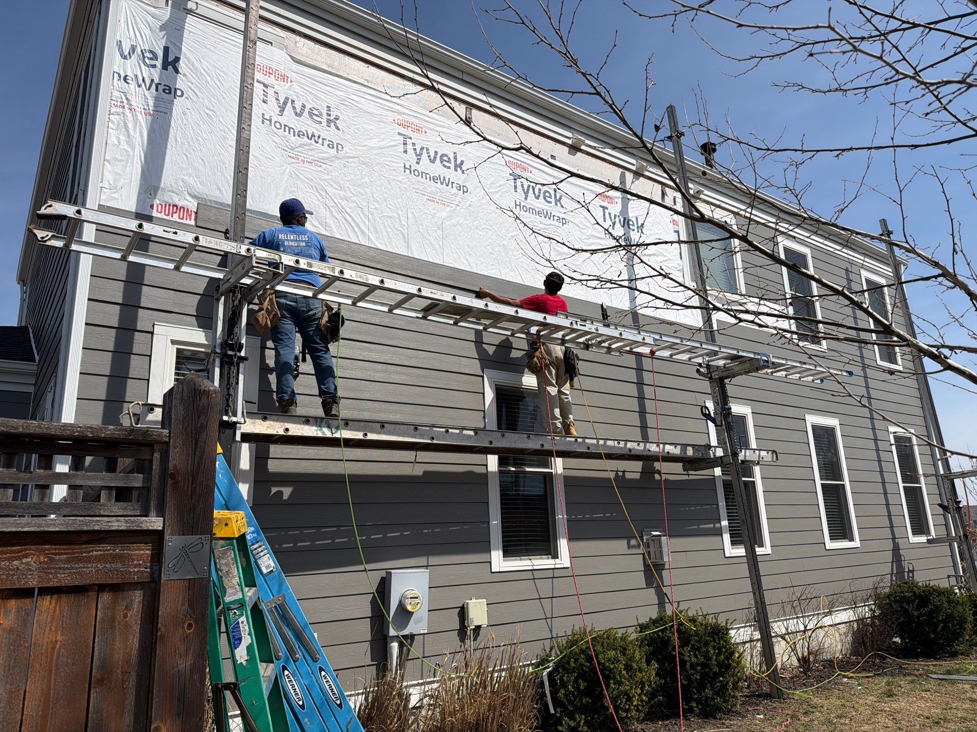Complete Roof and Siding Replacement for Hail Damage in New Town, St. Charles by Acute Roofing And Exteriors 