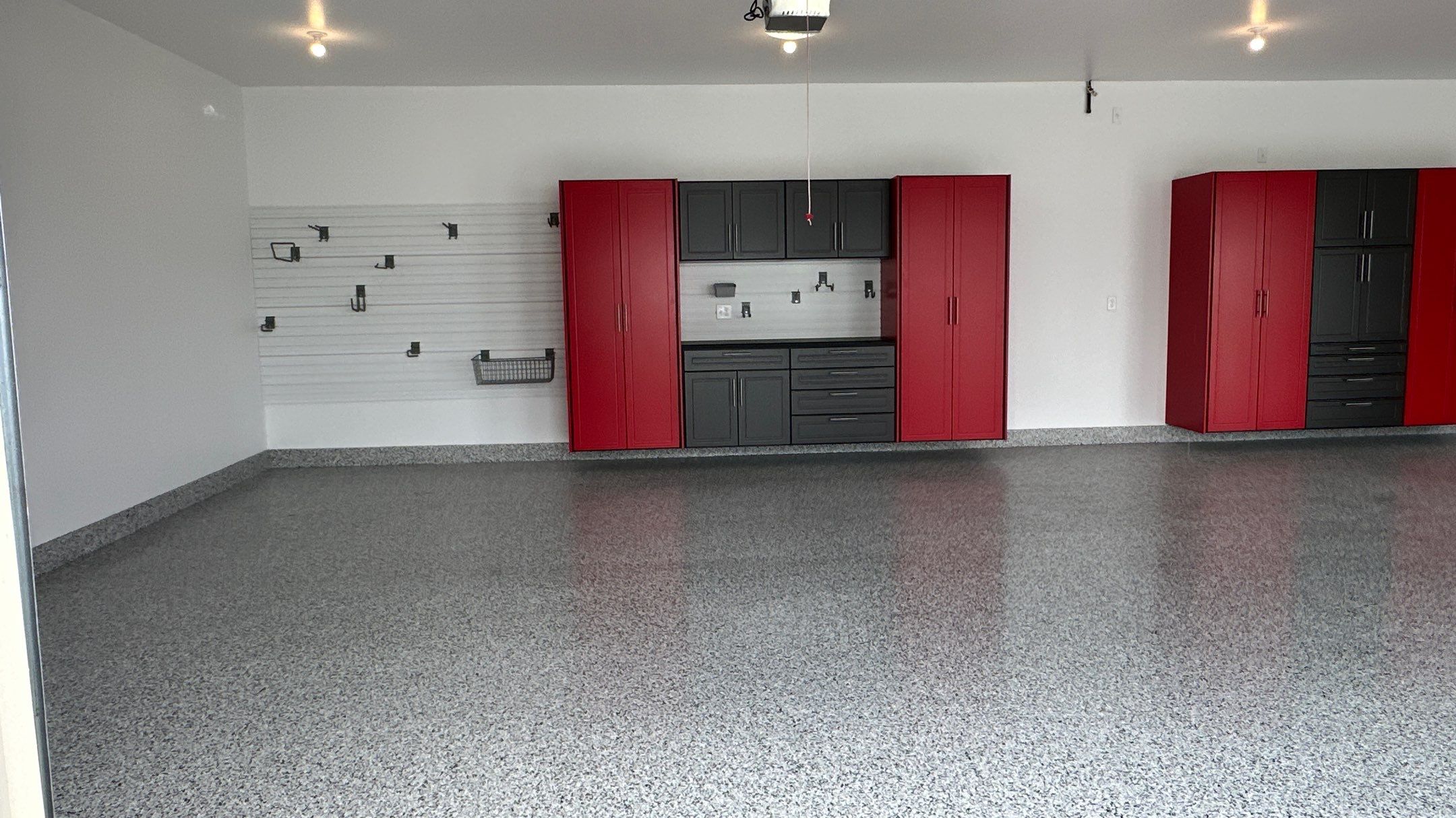 Louis P. transformed their garage into the garage of their dreams by Banner Garage