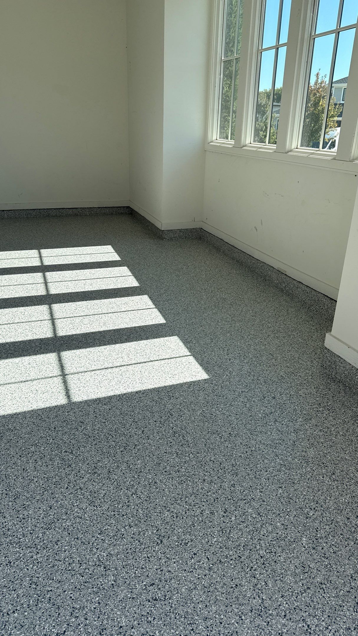Garage Remodel with Custom Cabinets and Epoxy Floors in Overland Park by Banner Garage
