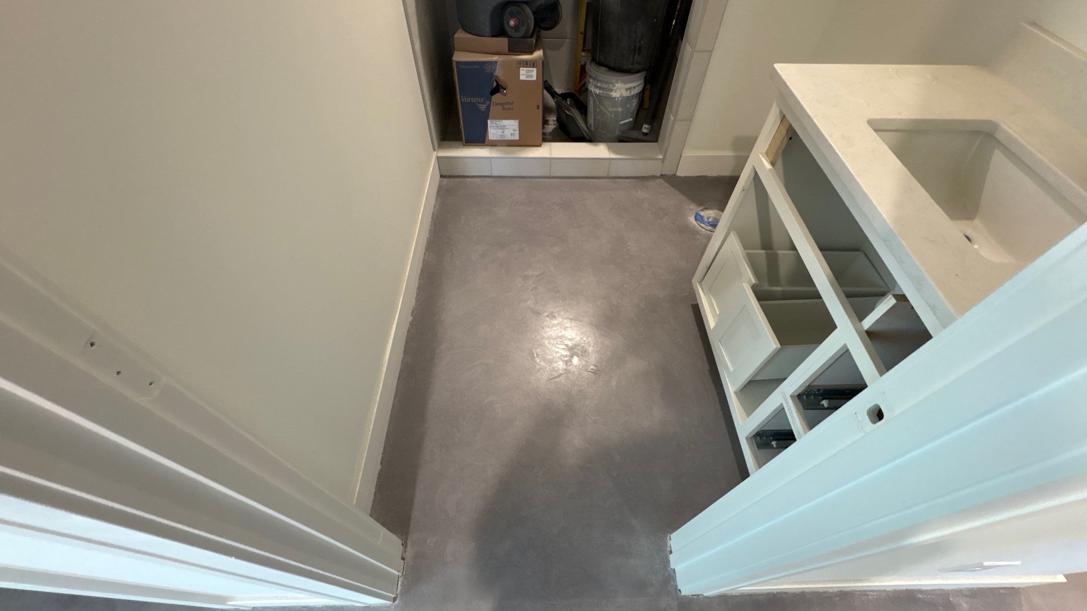 Basement Floor Overlay - Lawrence, KS by Big Red Decorative Concrete, LLC