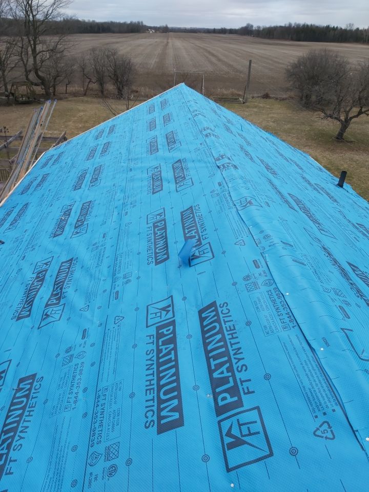Residential Roofing Installation using 16" Standing Seam Panels by Jay Carter Roofing & Sheet Metal
