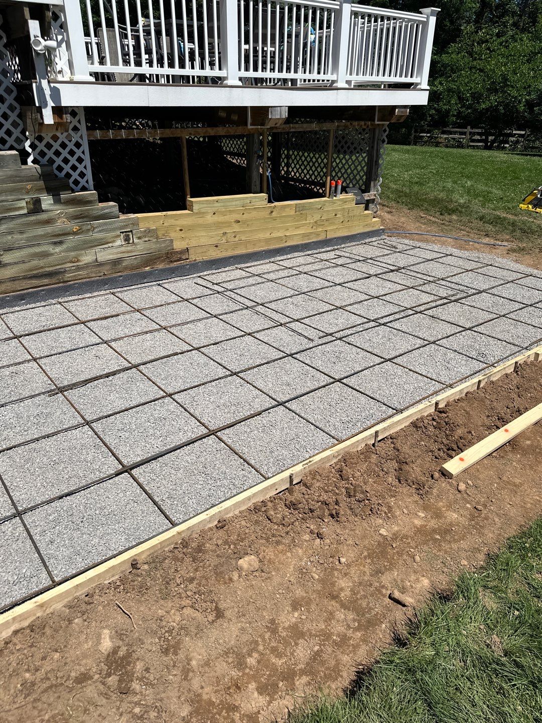 Rolled slate stamped patio  by NG Masonry & Construction LLC
