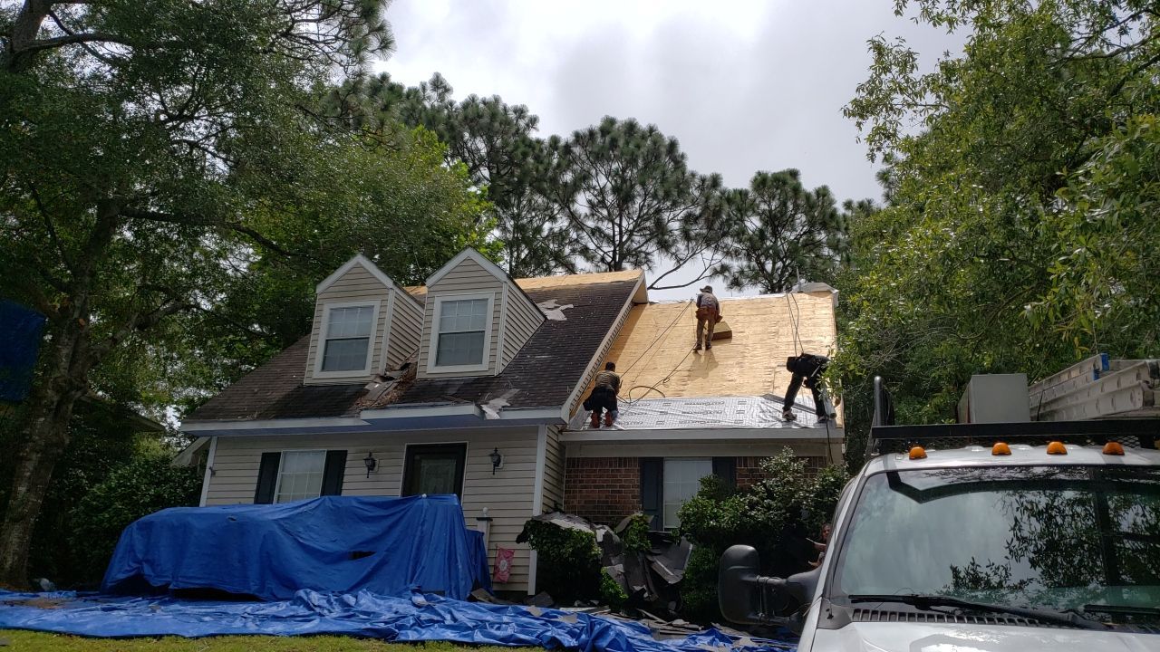 Residential Roofing Installation using Roof Replacement by American Roofing & Construction LLC