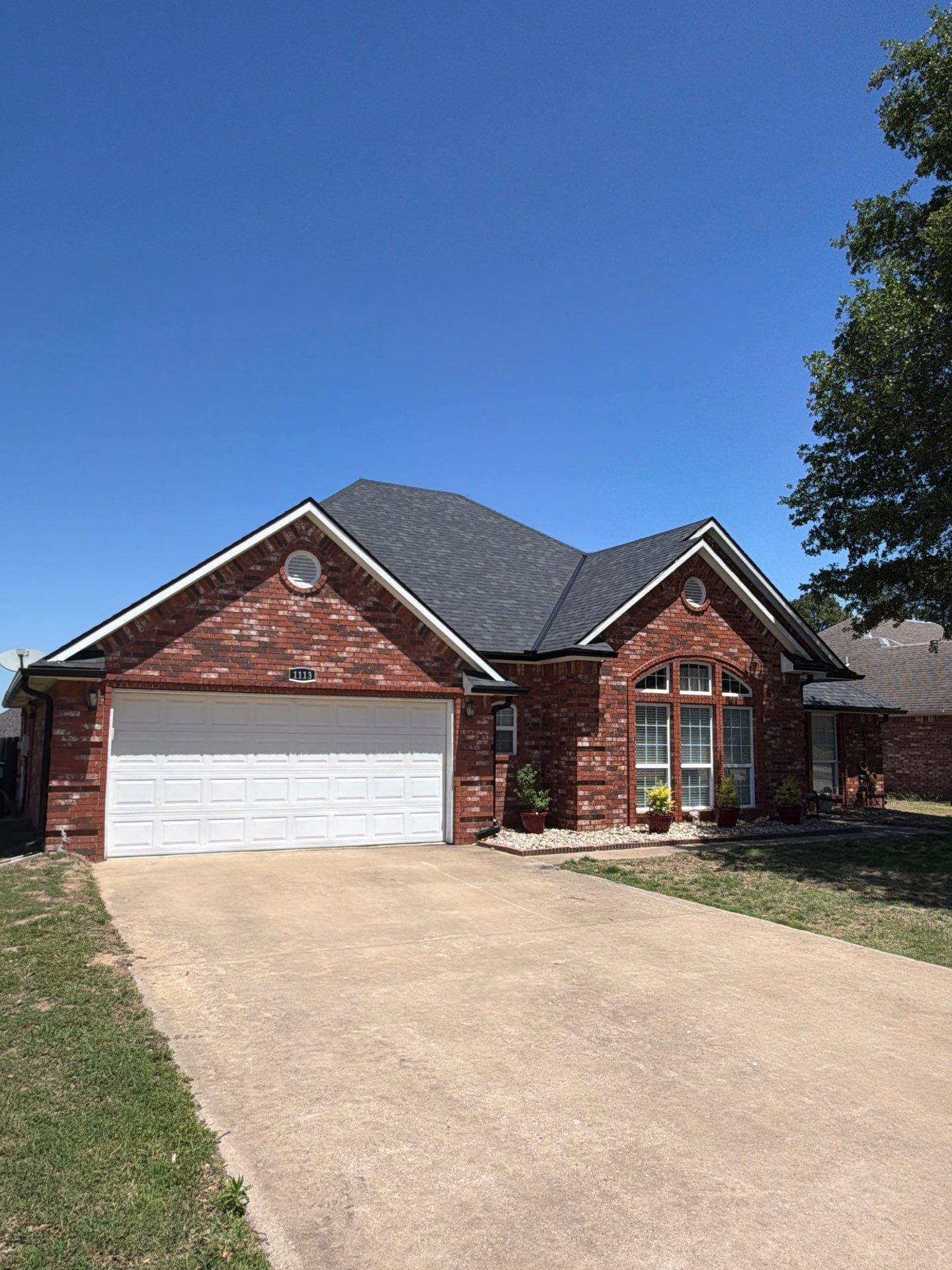Black roof & gutters!! by In & Out Construction & Remodeling, LLC