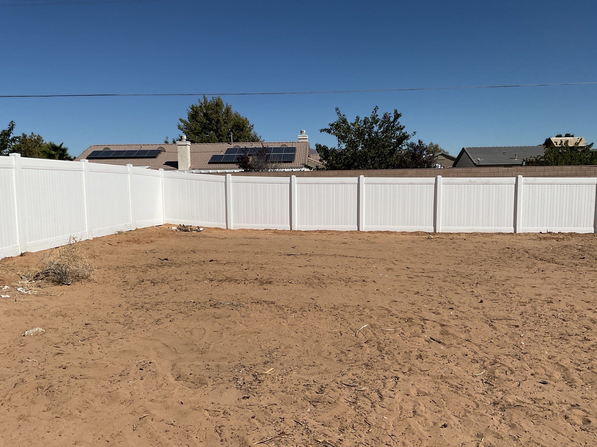 White picket fence  by Fence Guys Inc. 