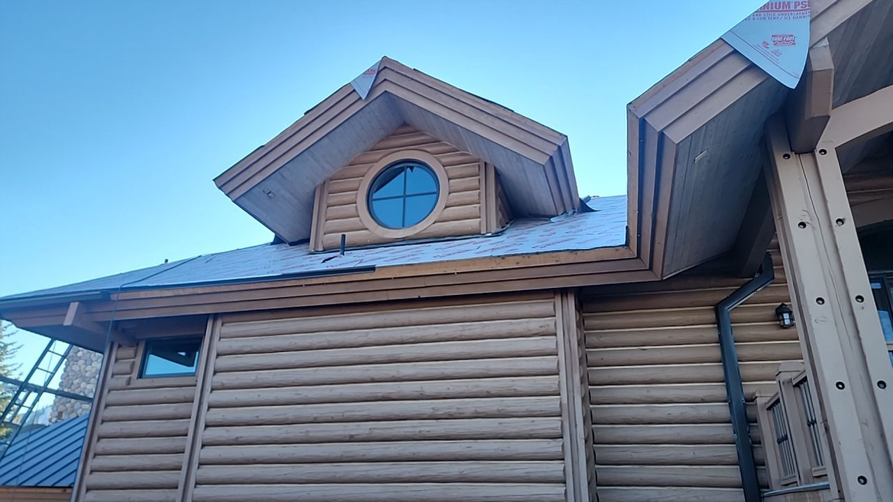 Standing Seam Metal Roof Replacement After Snow Damage by ASAP Roofing & Restoration