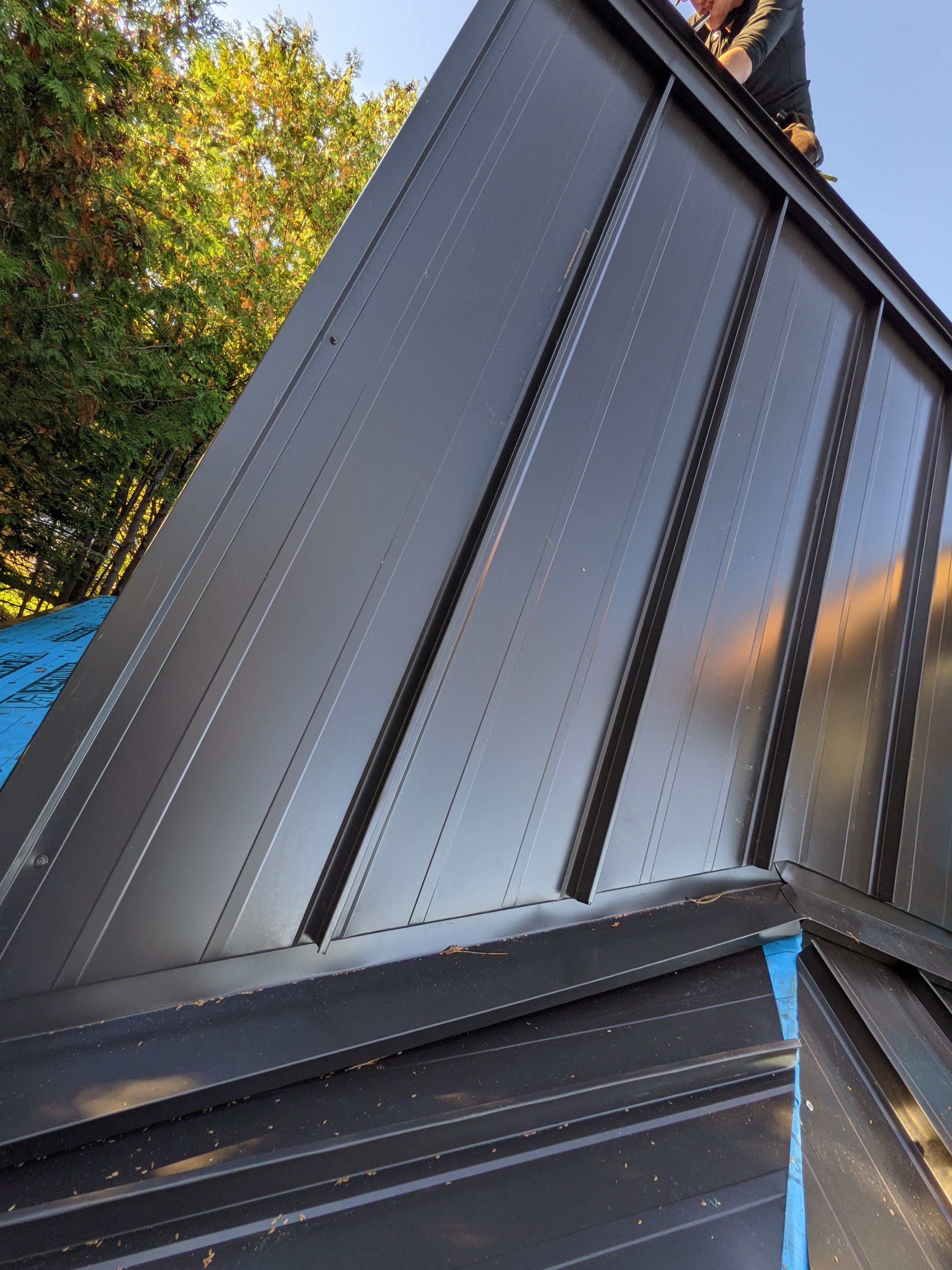 Residential Roofing Installation using 16" Standing Seam Panels by Jay Carter Roofing & Sheet Metal