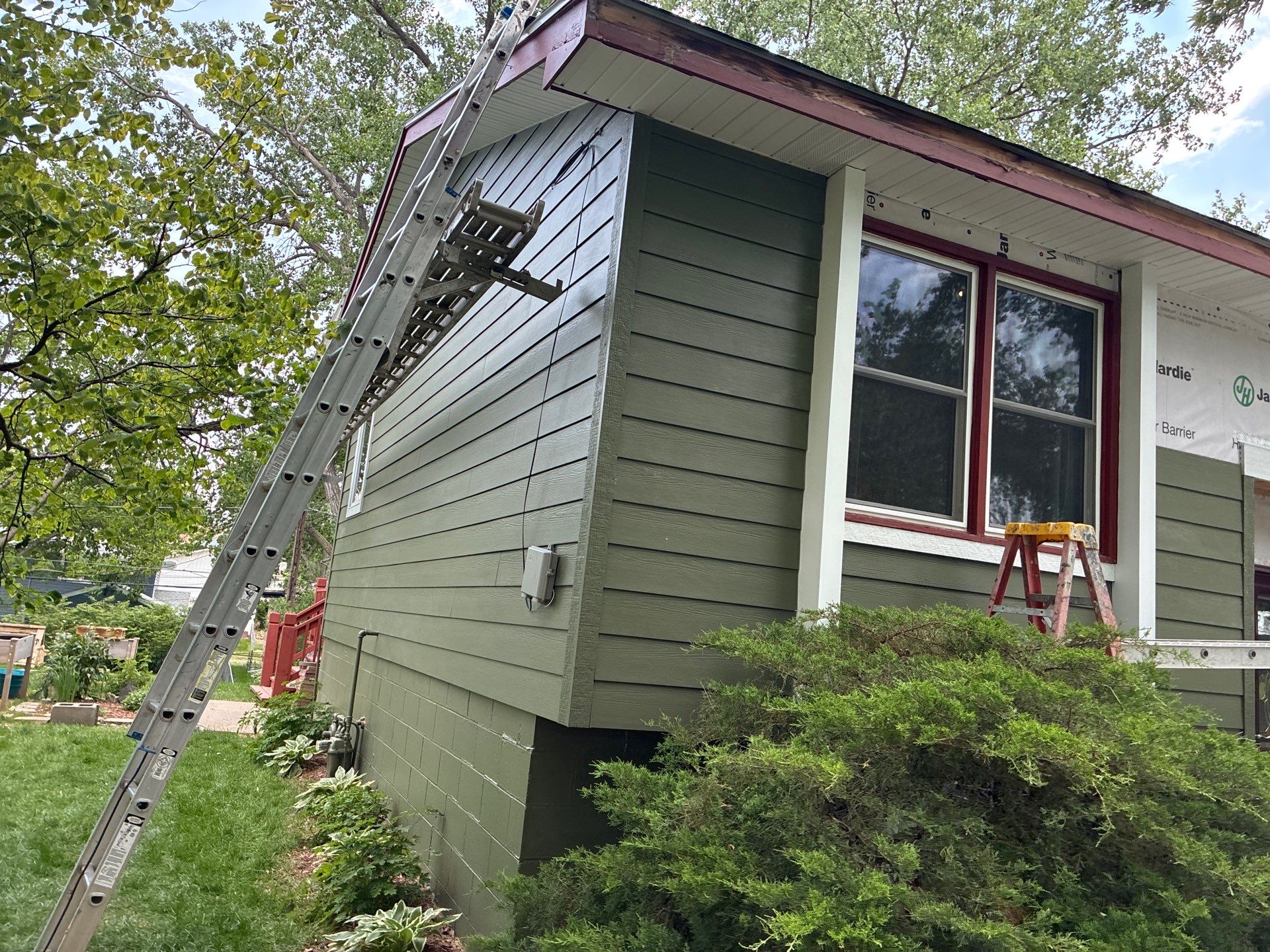 James Hardie Siding Replacement in Omaha with Mountain Sage Finish by Carps Complete Exteriors