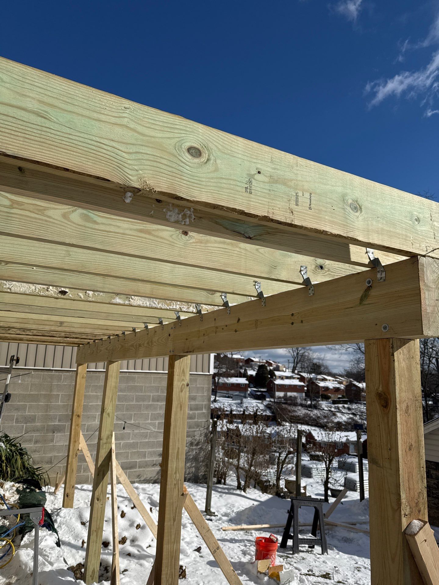 Deck and door by Cousins Roofing Siding & Decks