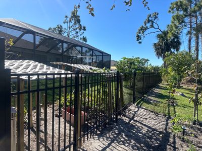 Aluminum Fence Installation using Black 3 Rail Aluminum Fence