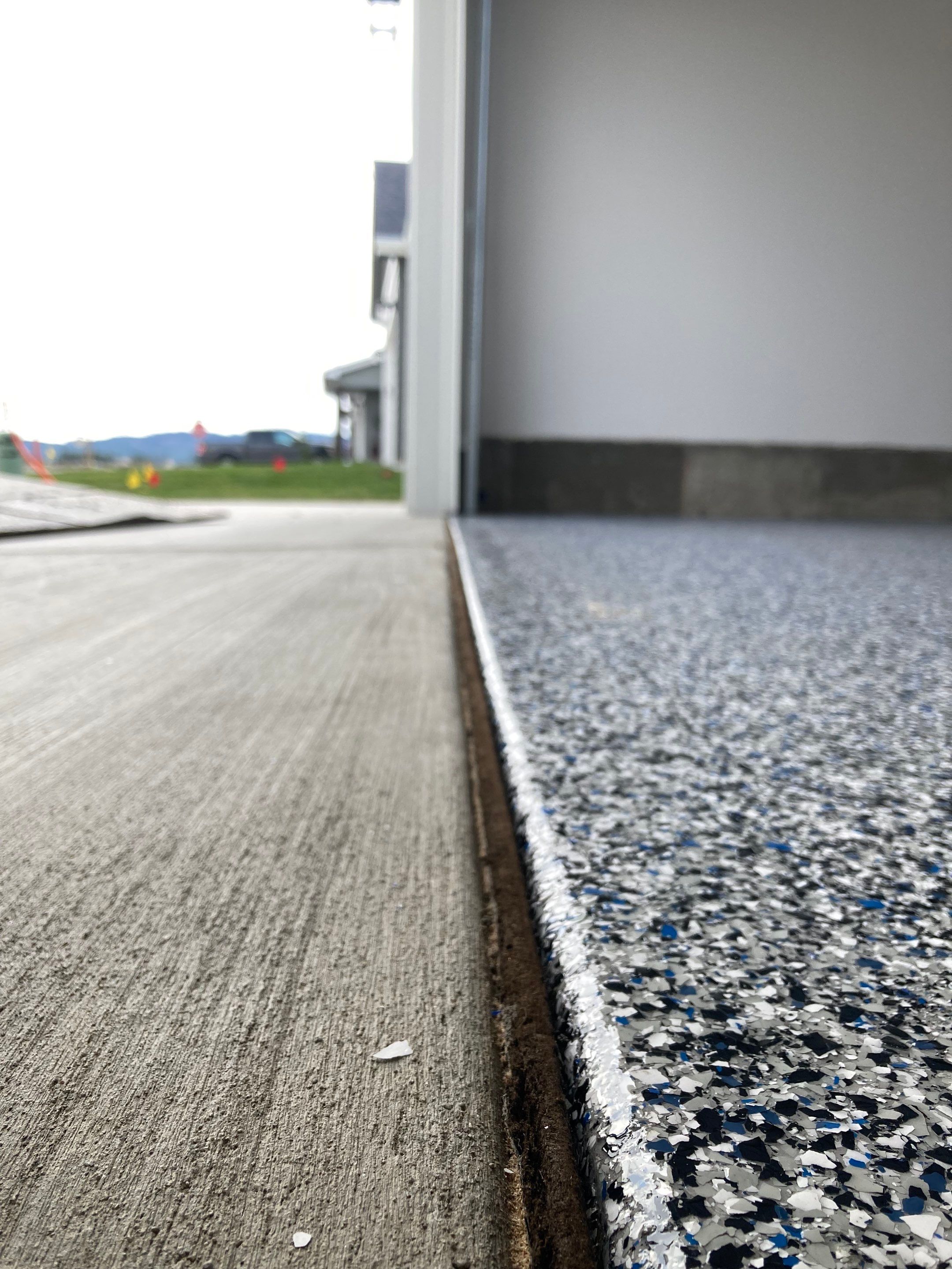 Garage Transformation using Domino with Blue by Croc Coatings, LLC