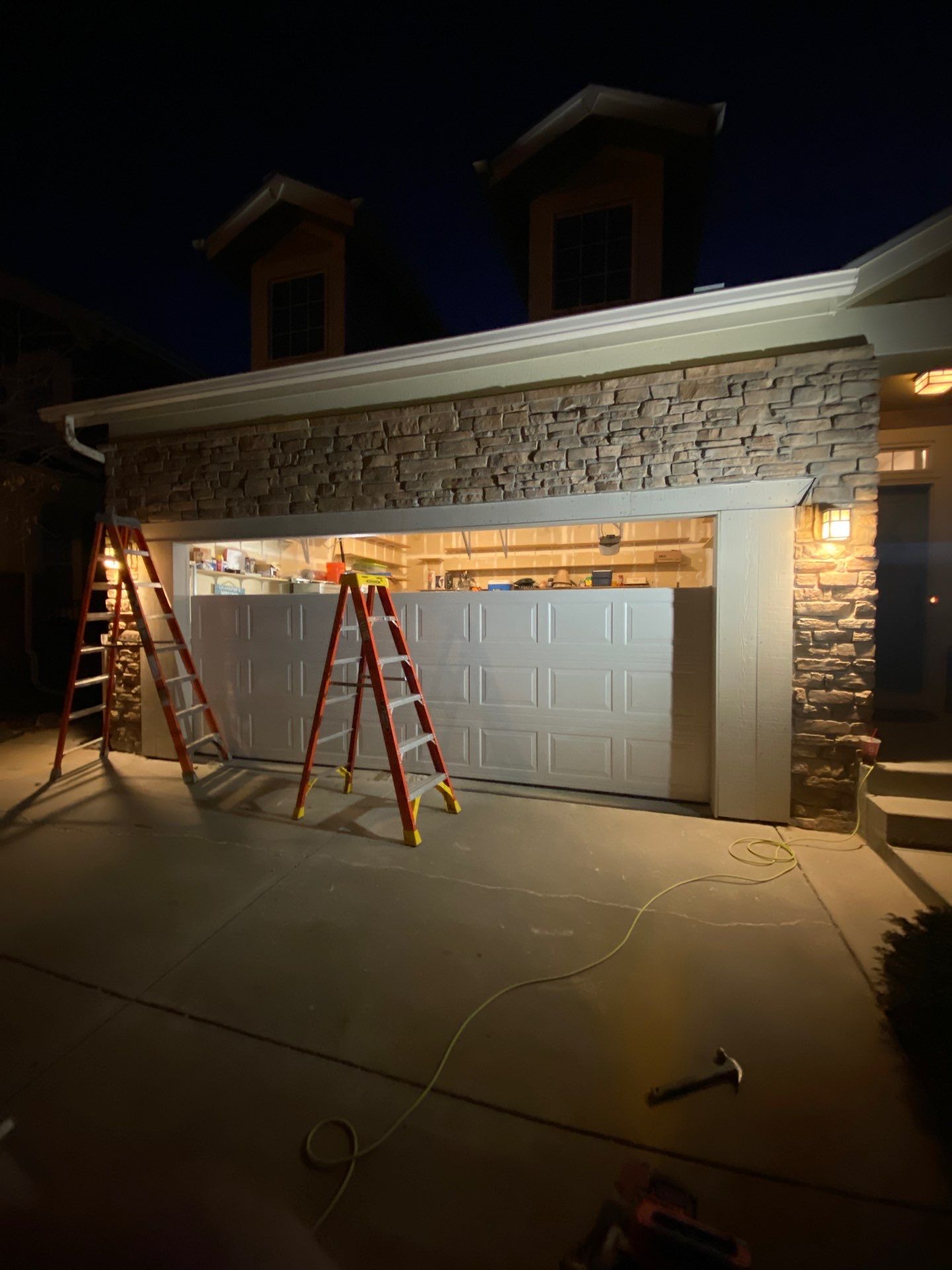 Garage door conversion by David & Goliath Contracting 