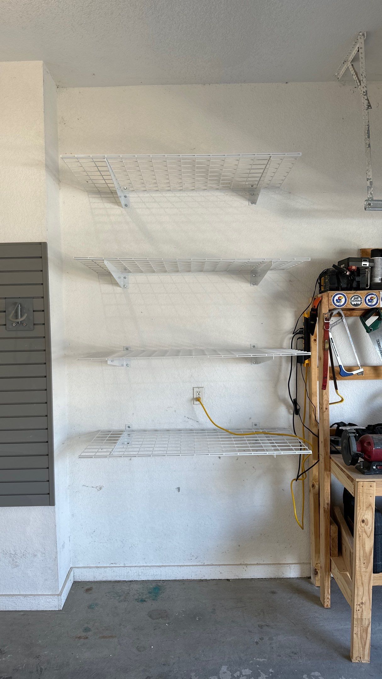 Melissa L. upgraded her garage with slatwall and overhead racks by Banner Garage