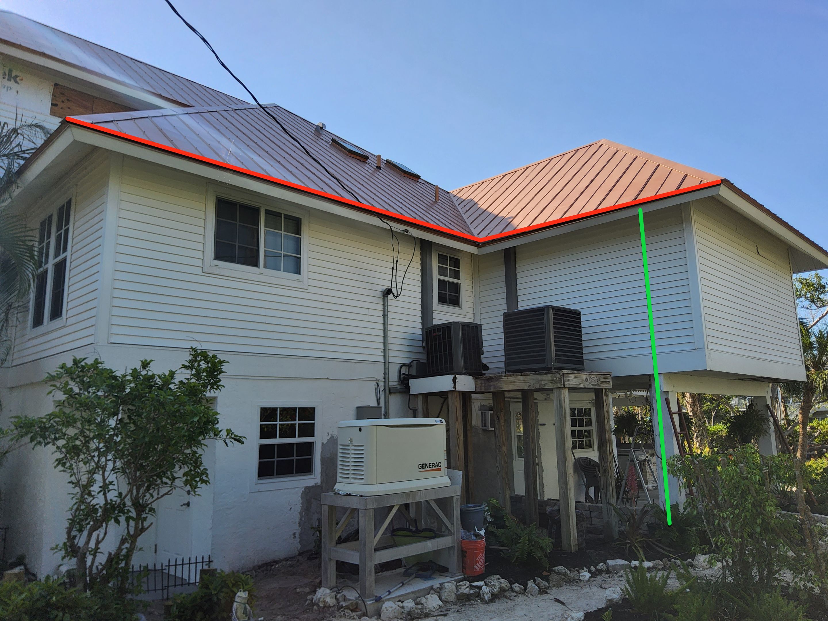 White K-Style Gutters Installed with White Downspouts in Sanibel FL by Gutter Professors