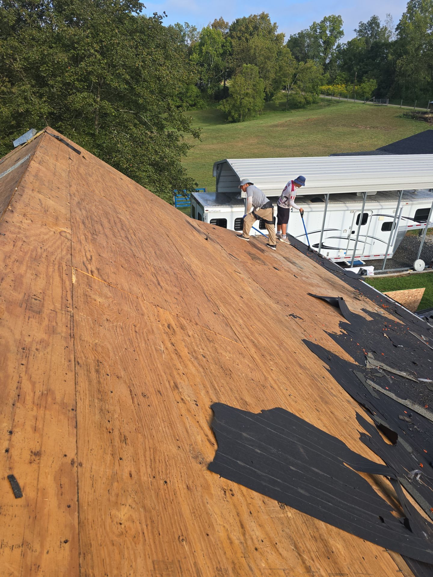Residential Roofing Installation using GAF Timberline HDZ Charcoal by Rainstoppers Roofing