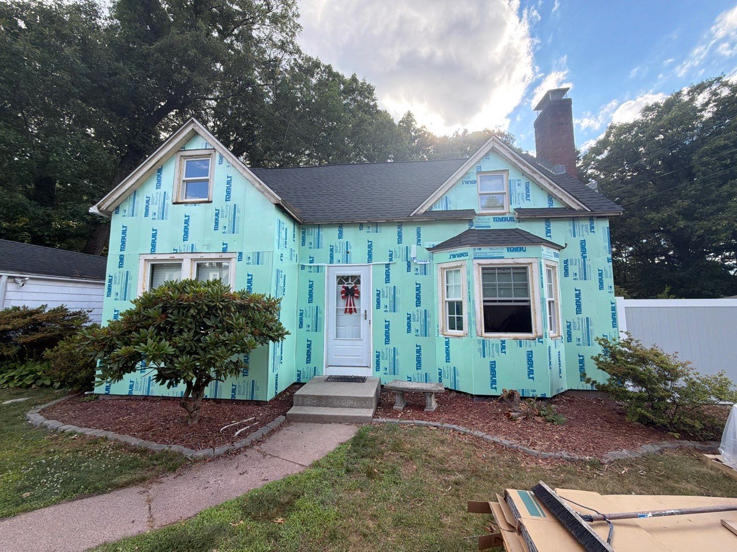 Stunning Siding Makeover with Cert Monogram D/4 x 16' clapboard, Charcoal Gray and Cert Monogram D/4x25' clapboard, Charcoal Gray by DiGiorgi Roofing and Siding Inc