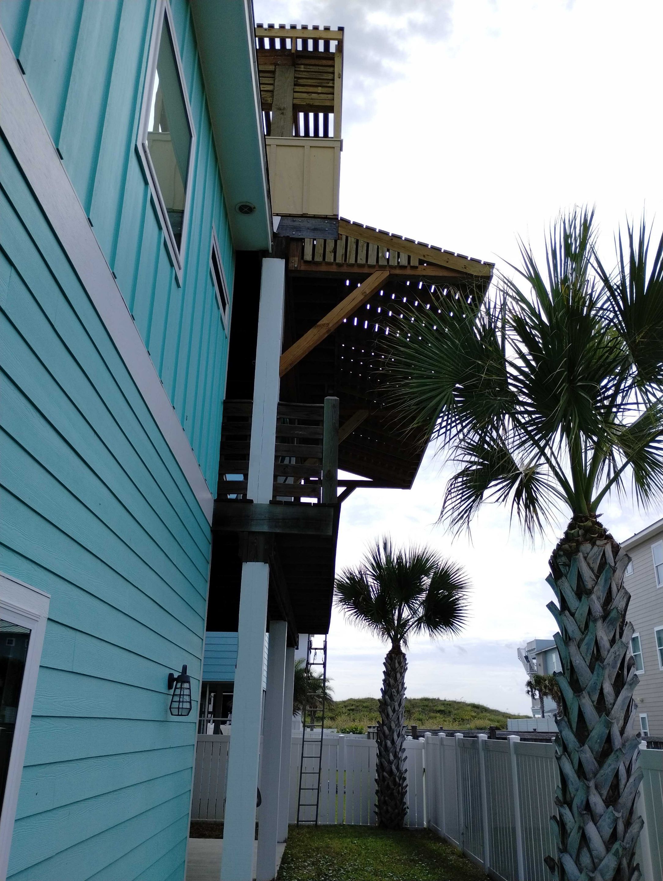 Roof Top Clubhouse on the Beach by Bayfront Roofing and Construction