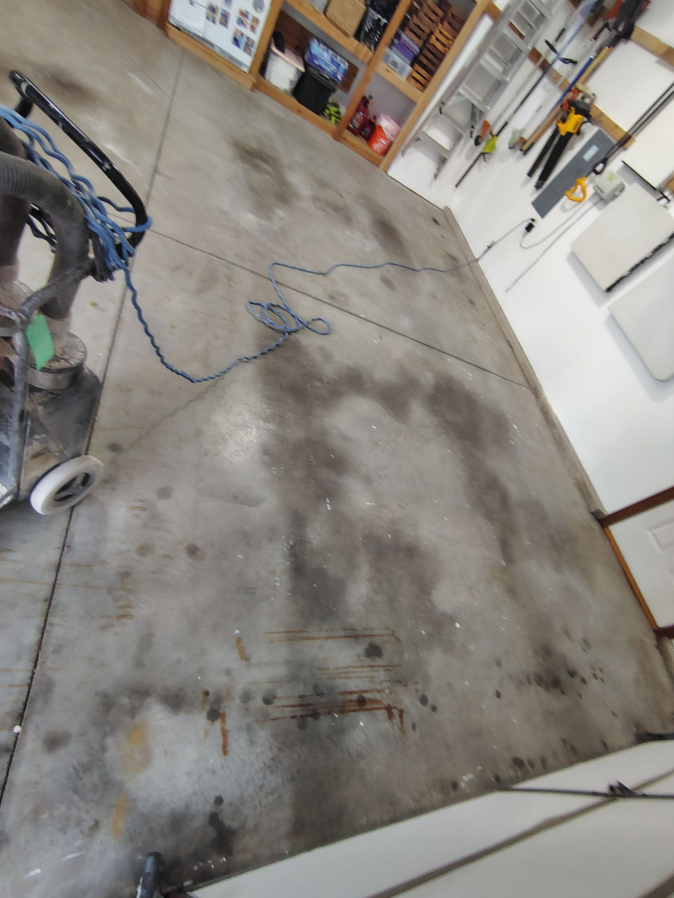 Coyote Garage Floor Coating in Sioux Falls by Select Painting, Coatings & Garage Cabinets