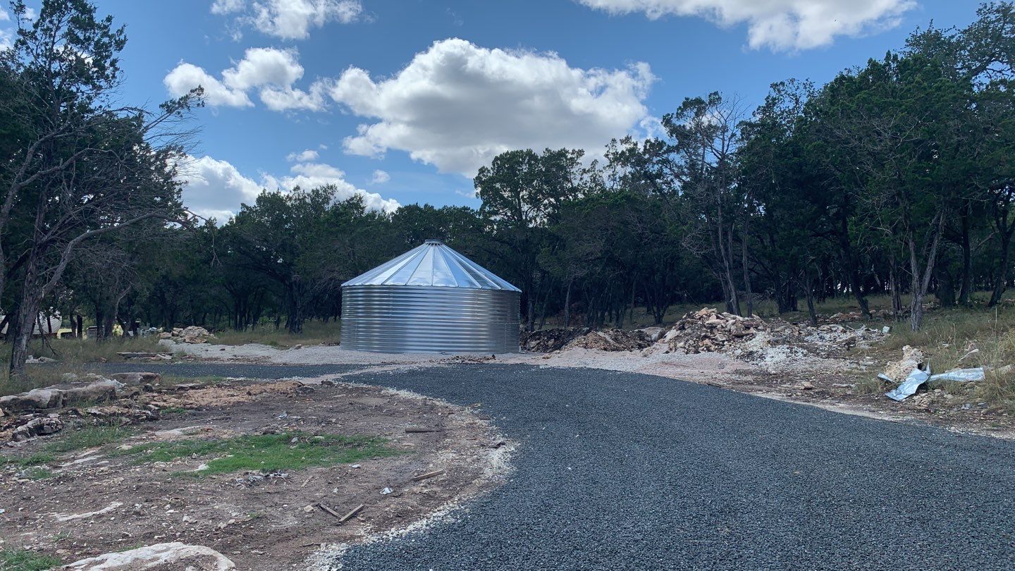 150K Equestrian center with 25K backup tank for potable water. by Hill Country Rain Water