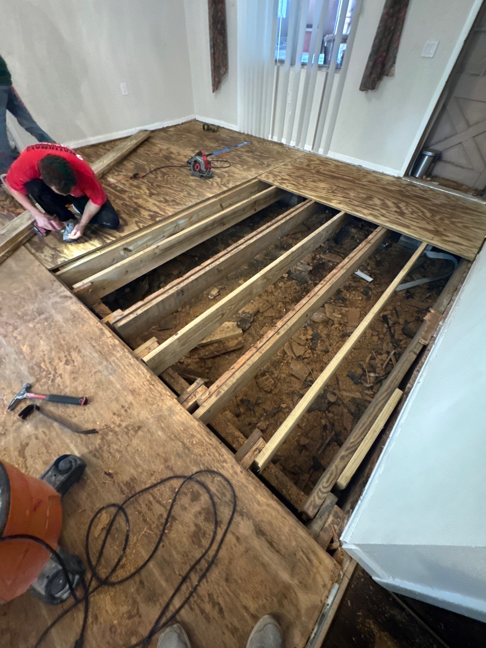 Subfloor Repairs & Flooring Installation by Axtra Hand