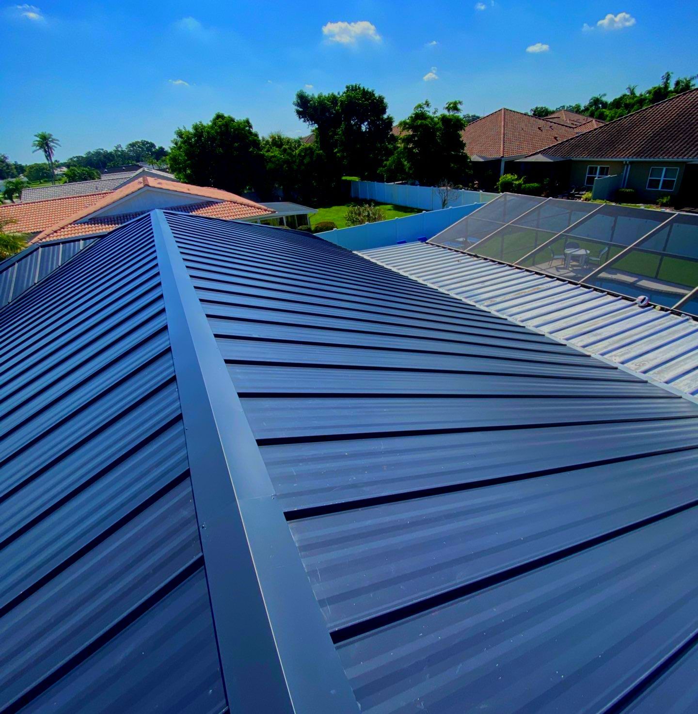 Metal Roofing System by Rooster Roofing, LLC