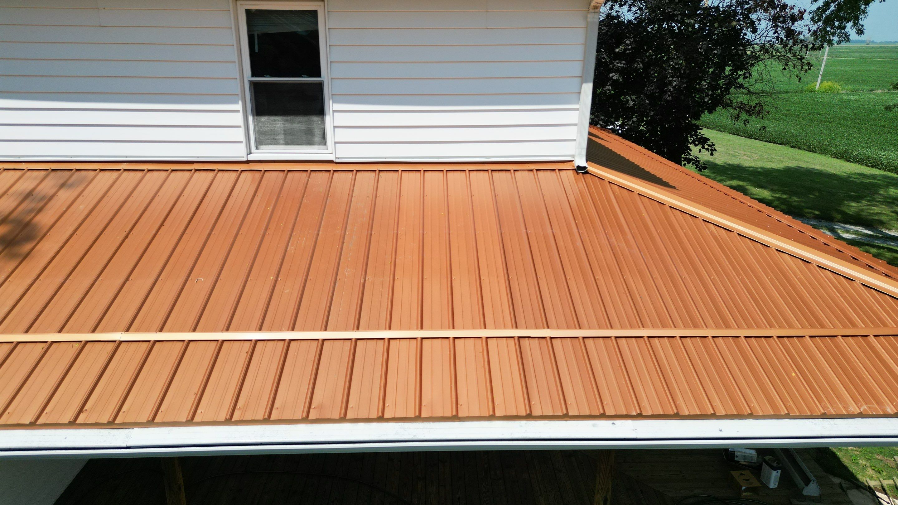 Residential Roofing Installation using Performance Panel Metal - Copper Metallic by RoofX 