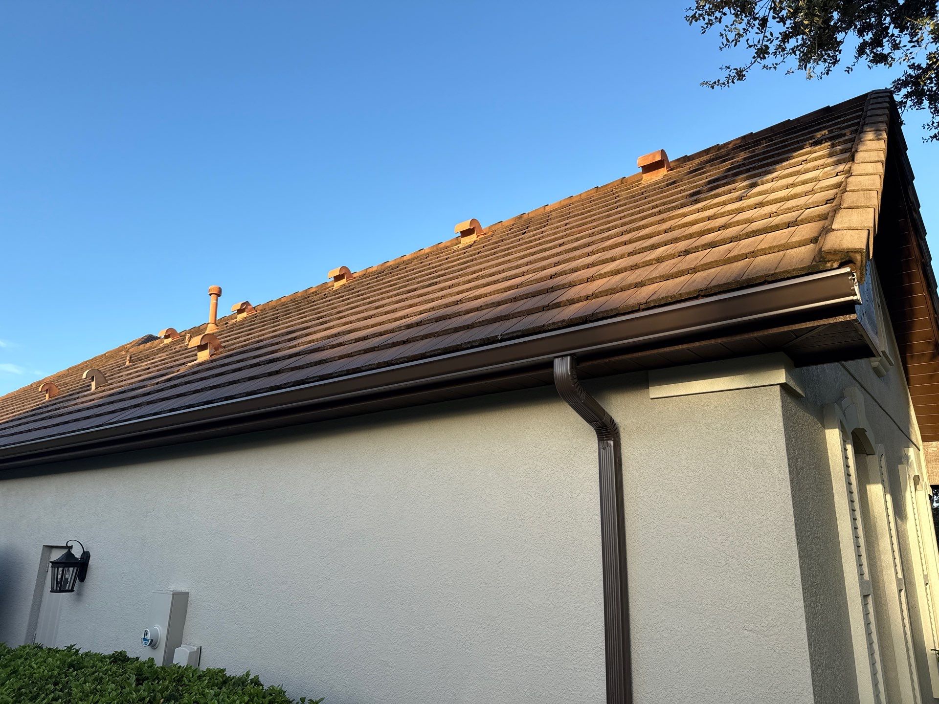 Tile Roof, Paver Pool Deck & Flowerbed Curbing Cleaning | Winding River Bradenton, FL Transformation by Sunshine AquaWash