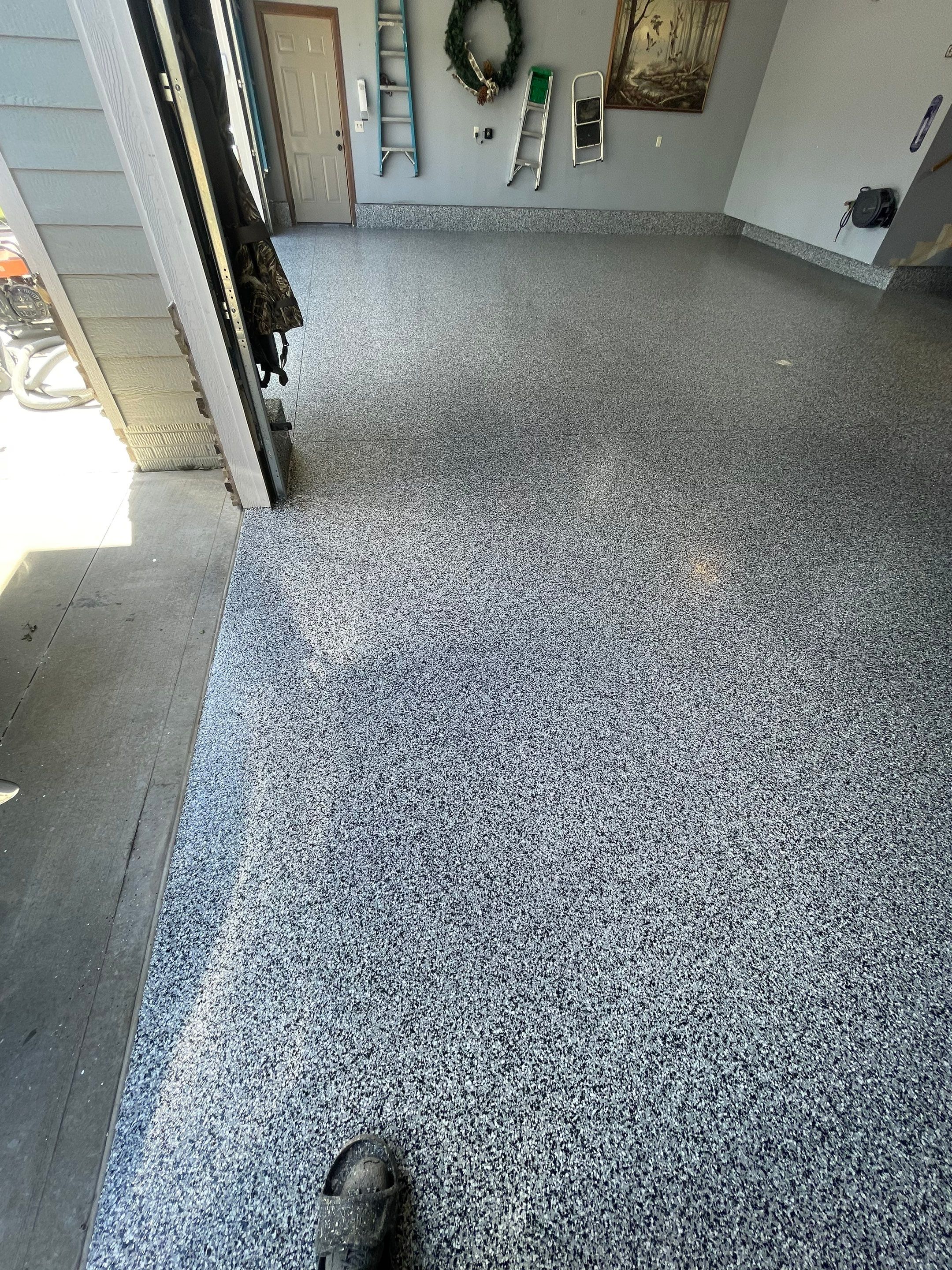 Residential Garage Floor Coating in Sioux Falls by Select Painting, Coatings & Garage Cabinets