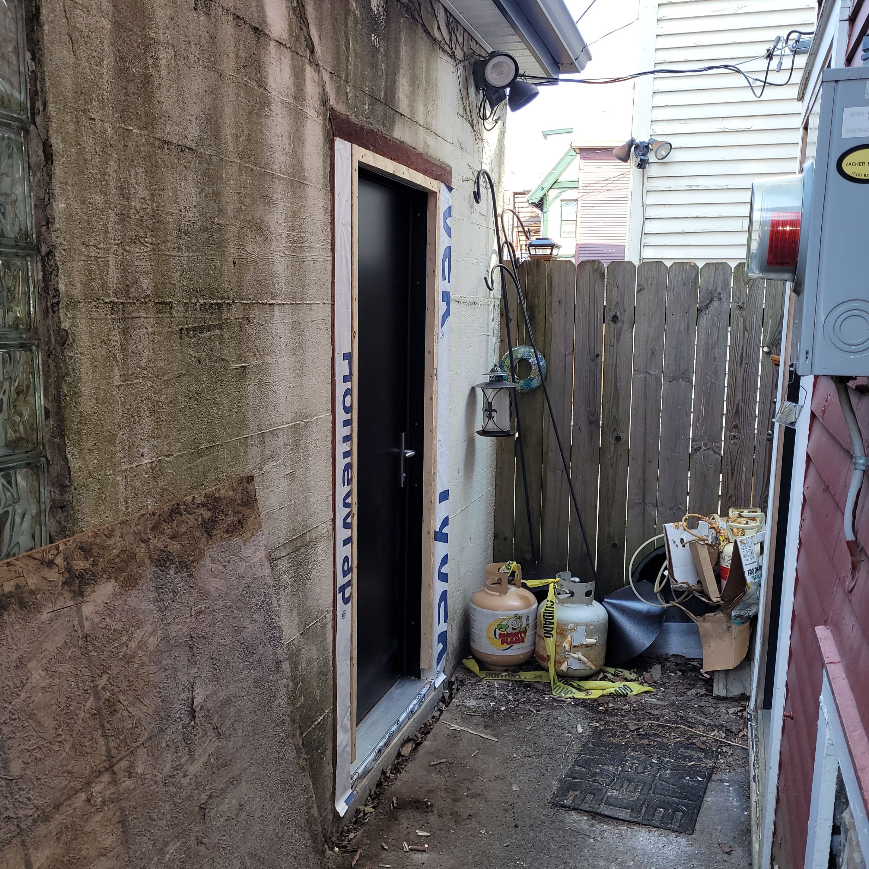 Exterior Renovations- Siding, Stamped Concrete, Porch, and Railings by Ivy Lea Construction