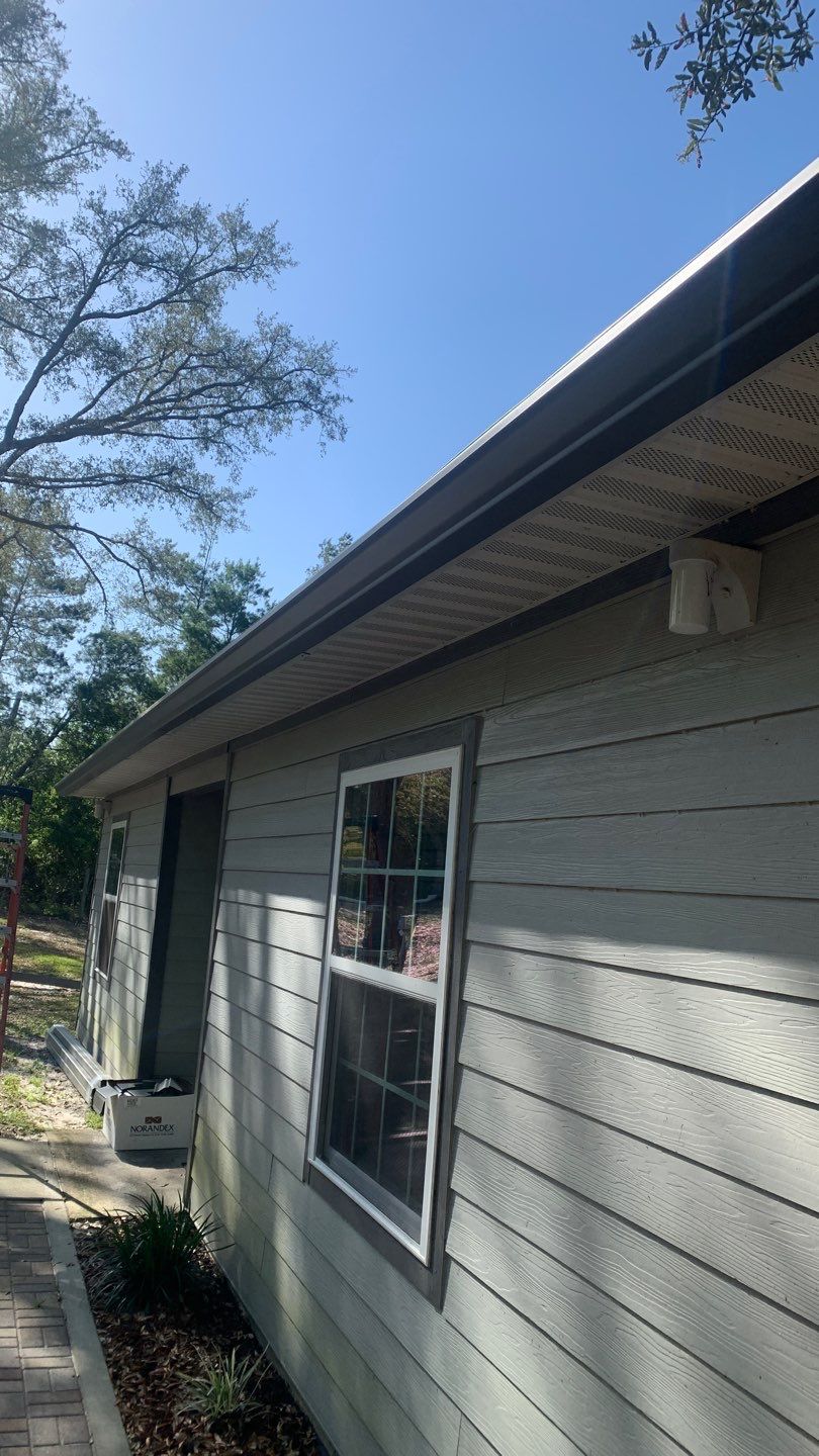 Gutter Installation Using Charcoal Grey K-Style Seamless Aluminum Gutters by Gutter Professors
